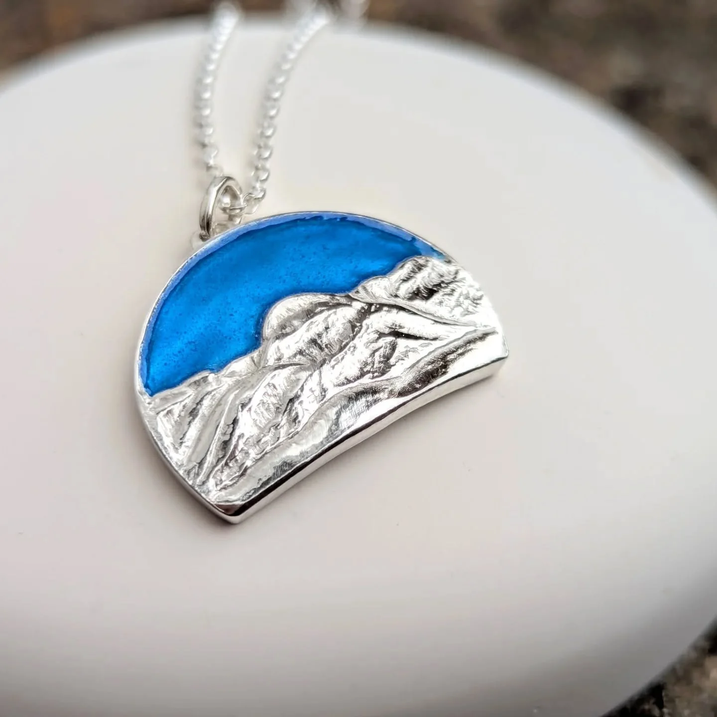 The Three Sisters necklace, inspired by the Three Sisters in Glencoe. Sterling silver with blue enamel. 

#sterlingsilver #enamel #scotland #glencoe