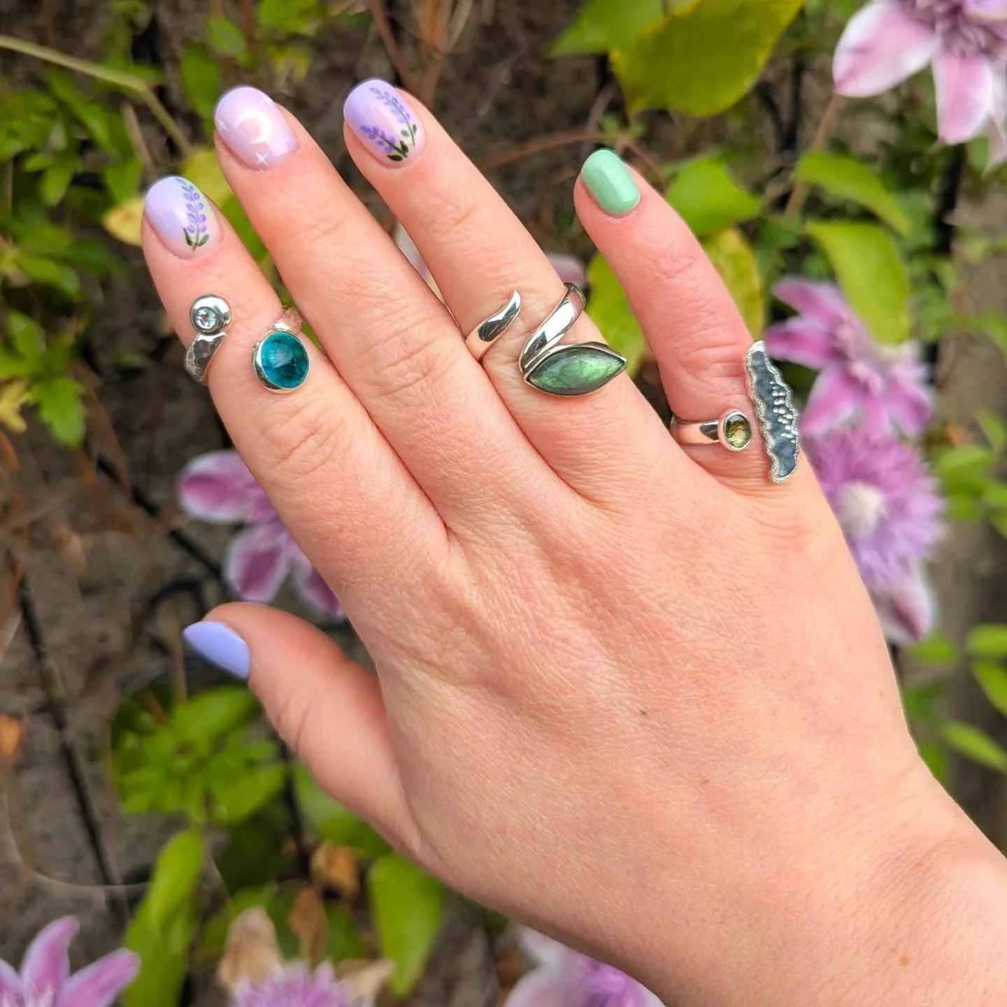 New rings! What better way to show them off with new nail art and my garden clematis! Been getting back into stone setting and loving it. My favourite is definitely the tourmaline ring. Available on my website!

#rings #summer #edinburgh #tourmaline 