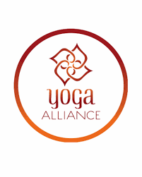 Logo for Yoga Alliance with a stylized lotus flower and the words 'Yoga Alliance' inside a gradient circle.