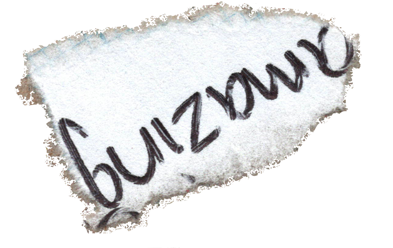 a torn piece of paper with the word 'amazing' written in ballpoint pen