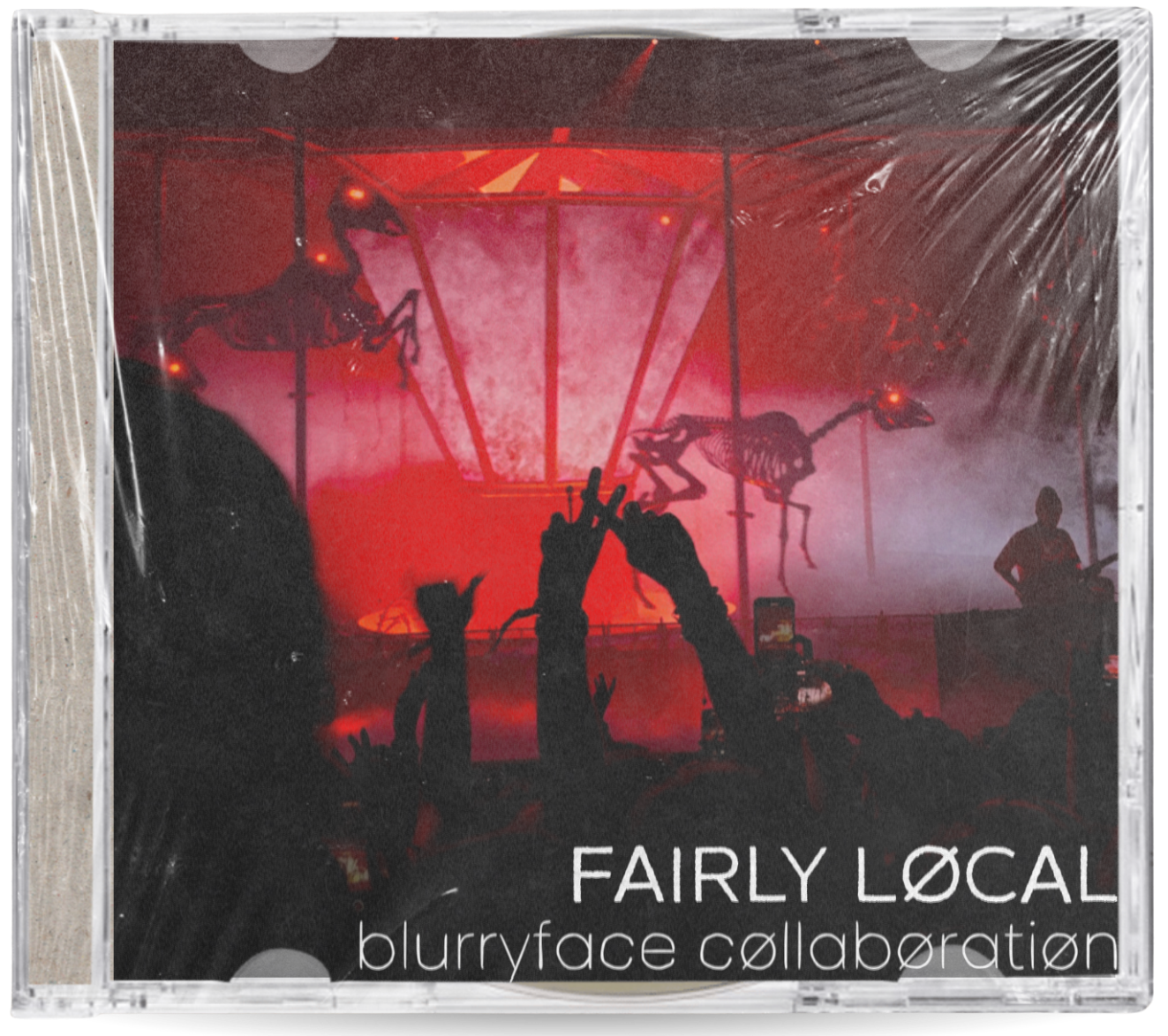 Album artwork for 'Fairly Local (Cover) by Interstellar Neighbourhood ft. Cinnamon Machin, Øzēn and Treble Core. Over an image of a Twenty One Pilots concert with red lighting, white text reading "Fairly Local: Blurryface Collaboration".