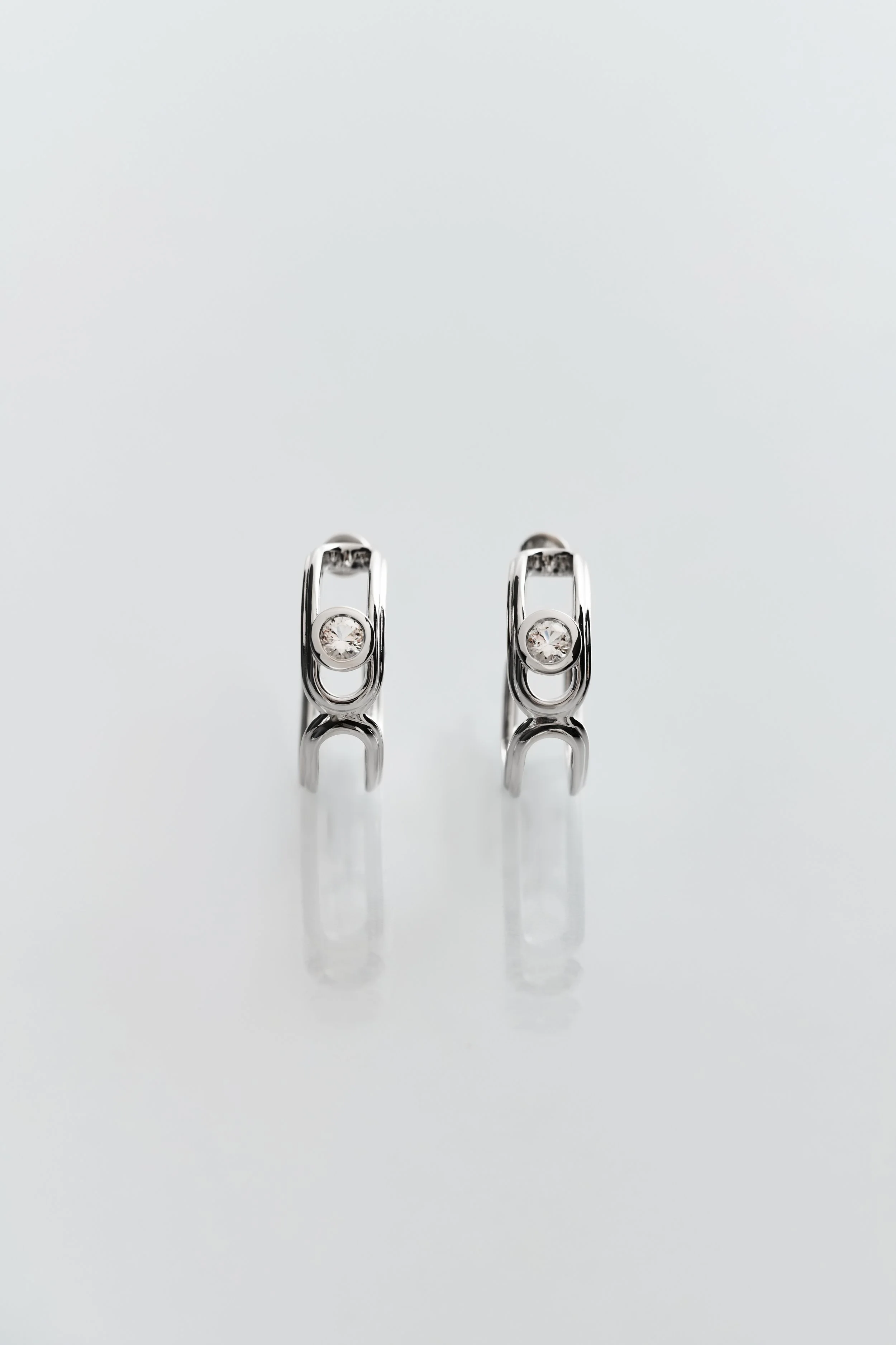 Rhodium vermeil Hollow Hoop Earrings with white topaz — a refined and minimalistic design from Lottie’s Loft sculptural jewellery collection