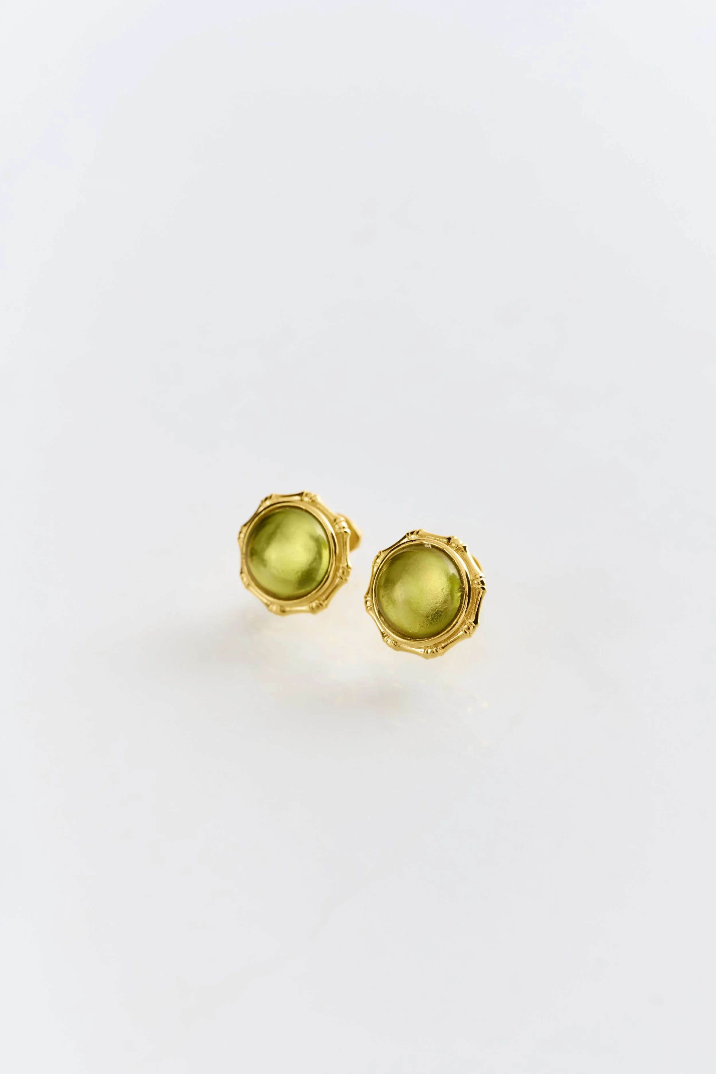 18k gold vermeil Bamboo Earrings with peridot cabochon — a classic statement earring from Lottie’s Loft