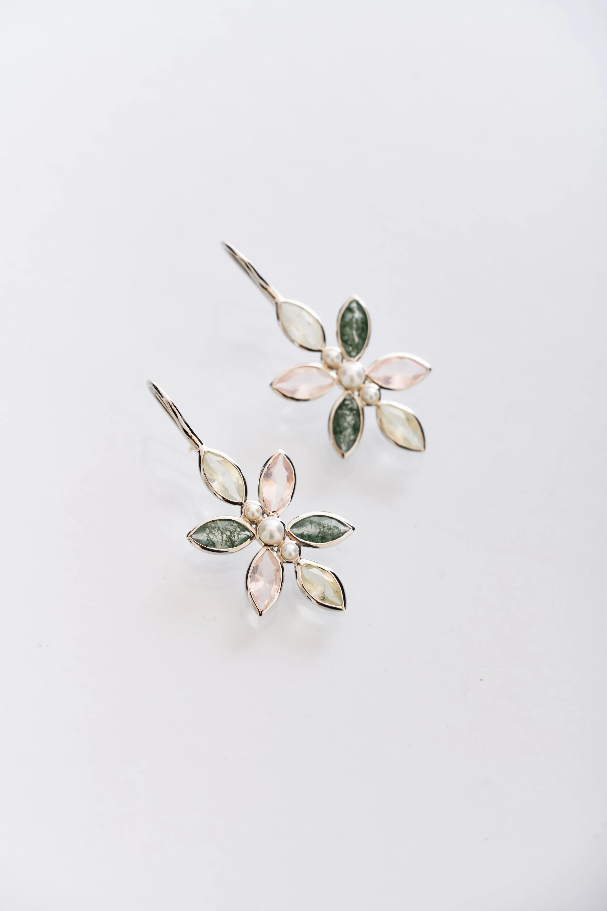 Rhodium vermeil Perennial Earrings with pearls, pink quartz, moss agate, and prehnite rutile — design-led sculptural jewellery with a petal motif.