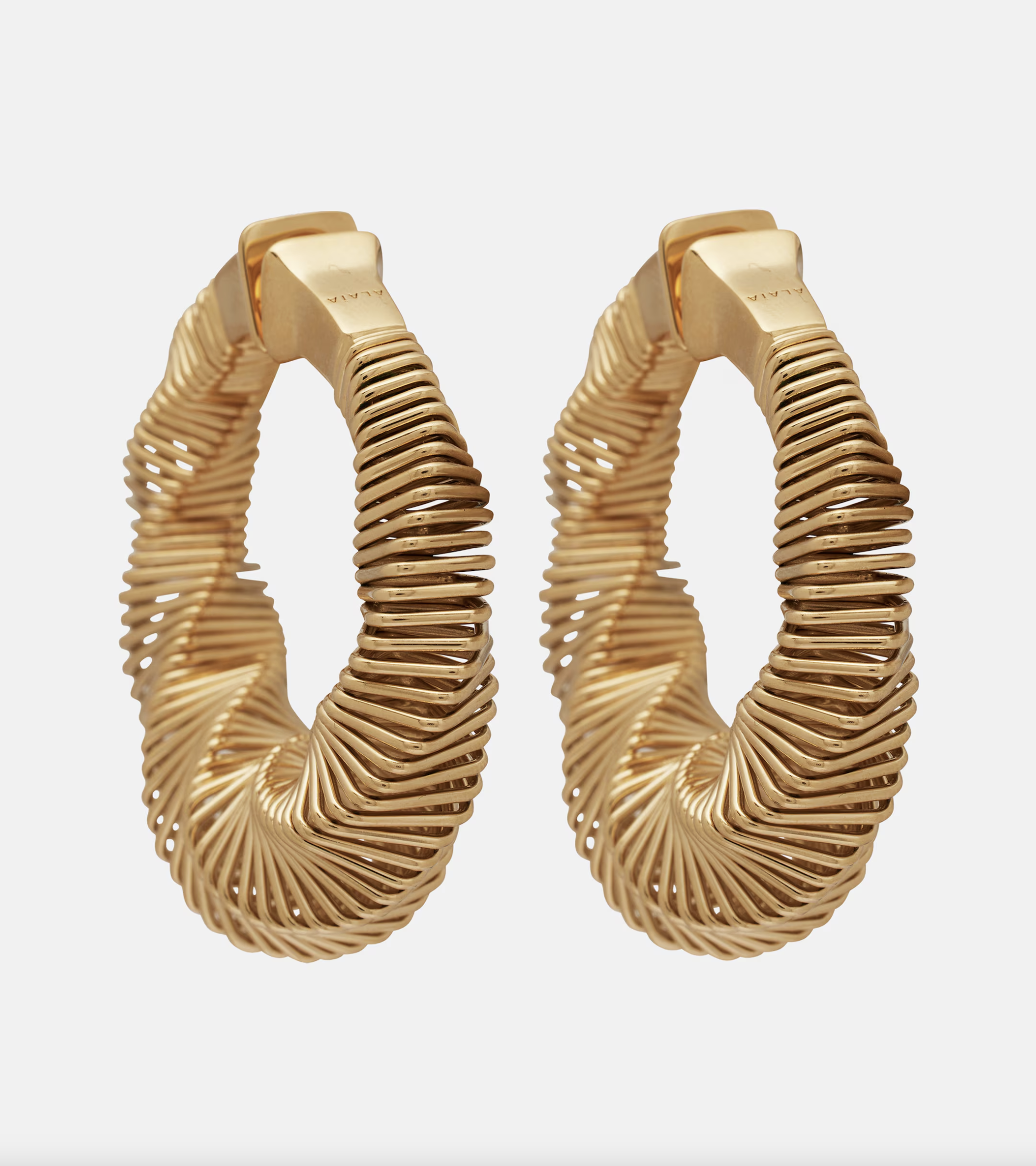 Alaïa Spiral Small Hoop Earrings, £590