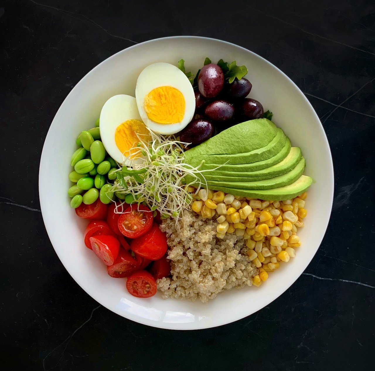 bowl of healthy food. Egg, avocado, tomato