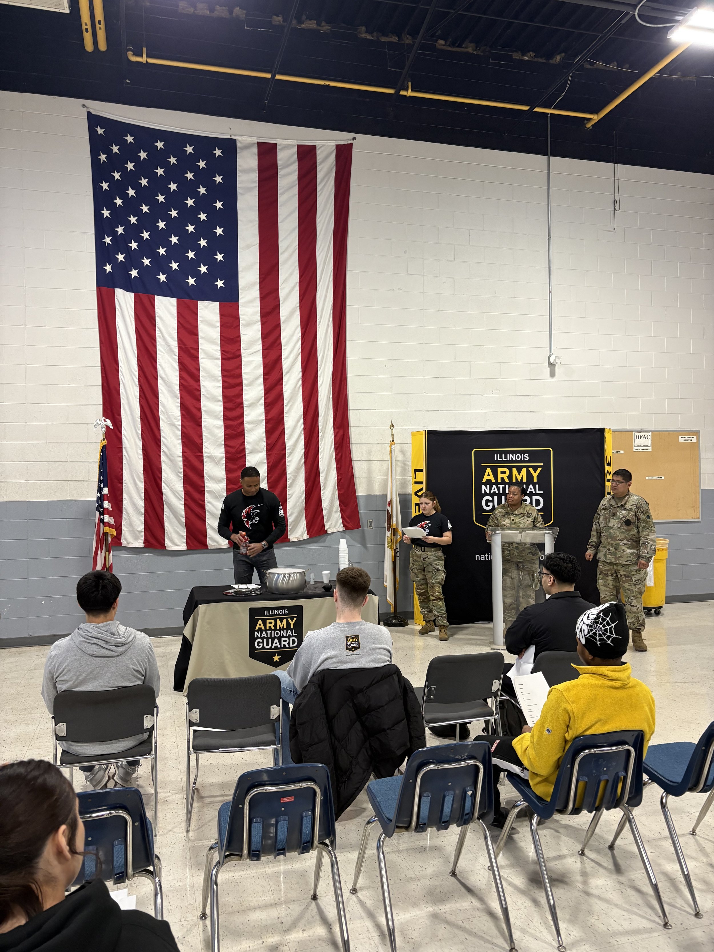 Geometric drawing of an outline square with sections divided by vertical, horizontal, and circle lines.