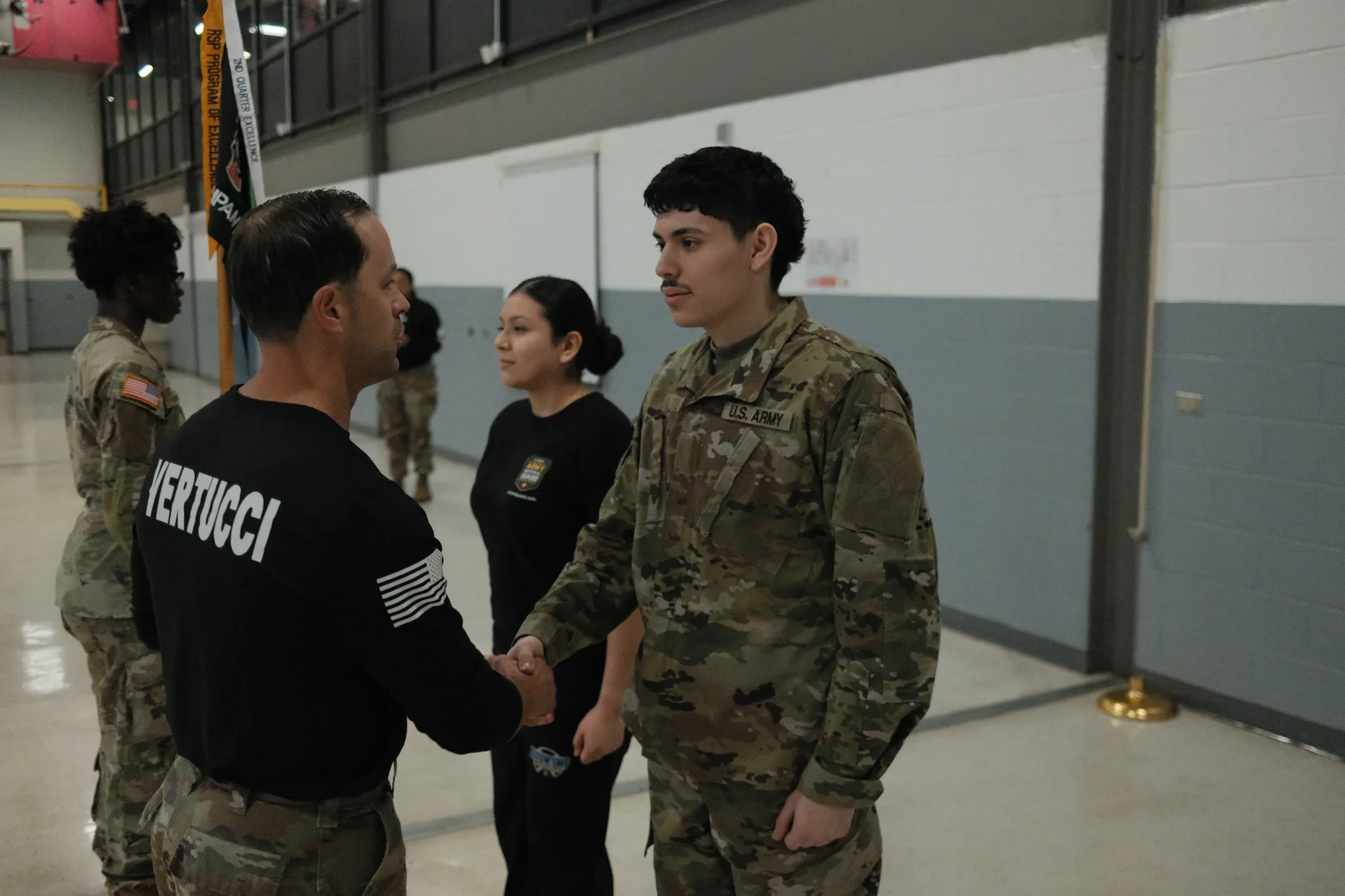 Geometric drawing of an outline square with sections divided by vertical, horizontal, and diagonal lines.