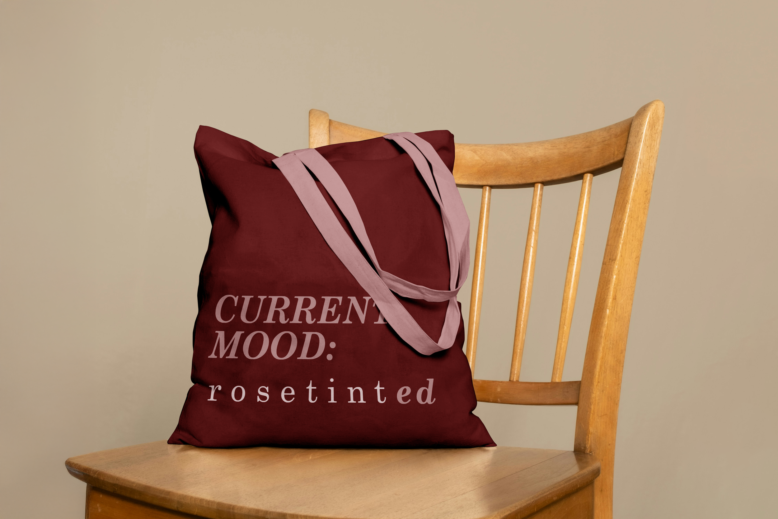 Rosetint 2 Canvas Bag on Chair Mockup.png