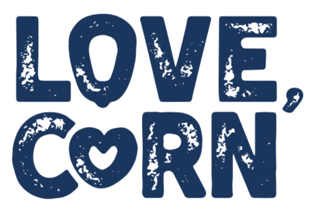 Text graphic saying 'Love, Corn' in distressed blue font with a small heart inside the letter 'C'.
