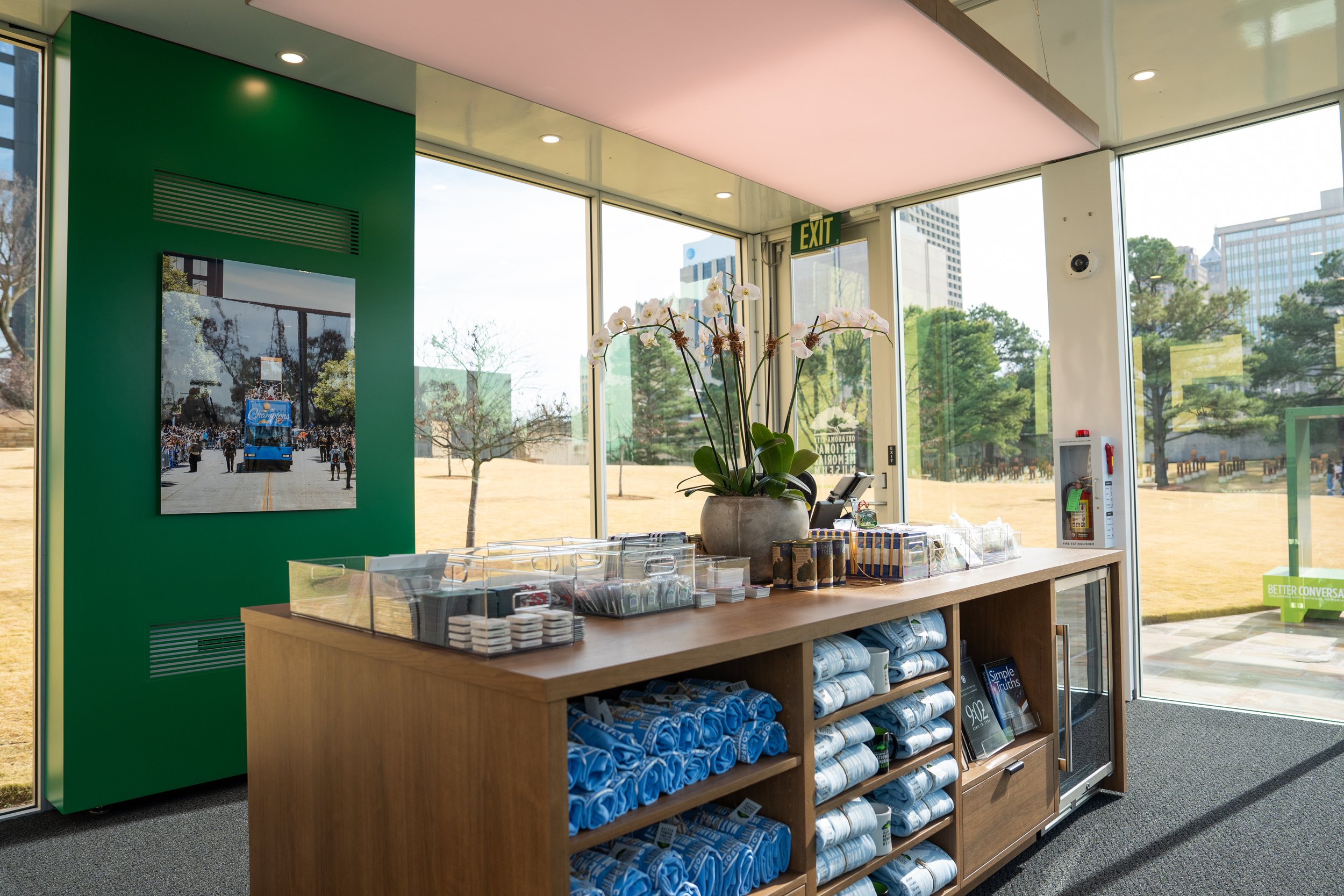 To maintain a seamless visitor experience during construction, a temporary lobby was designed to house both ticketing and retail. The space prioritizes clarity, warmth, and efficiency, ensuring guests can easily orient themselves while still feeling 