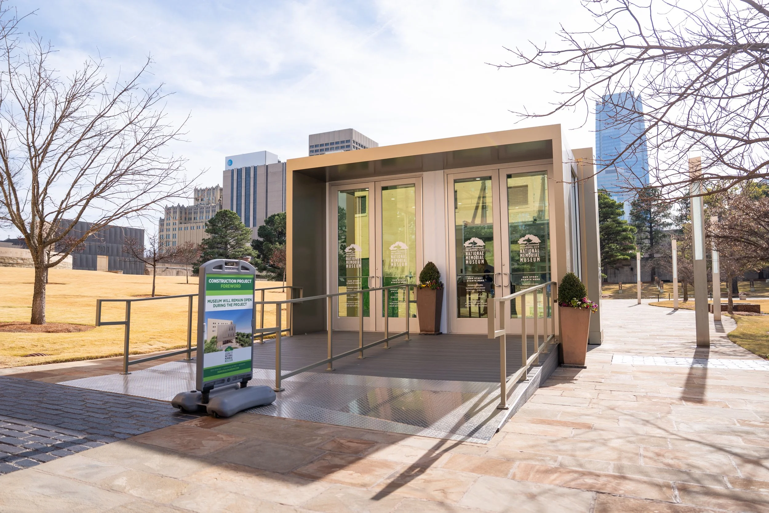 To maintain a seamless visitor experience during construction, a temporary lobby was designed to house both ticketing and retail. The space prioritizes clarity, warmth, and efficiency, ensuring guests can easily orient themselves while still feeling 