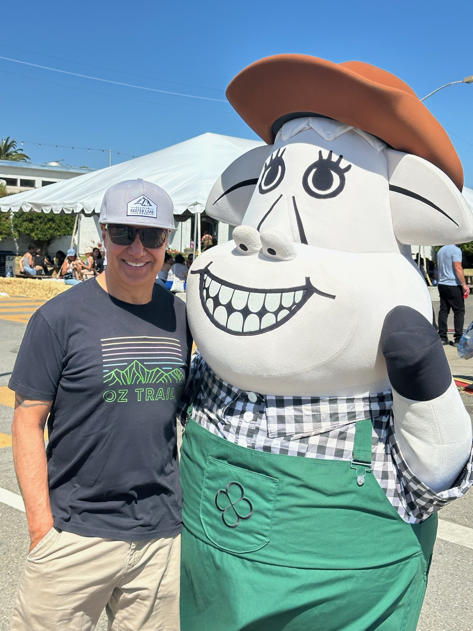 Dr. Ray posing with a local Petaluma dairy cow mascot