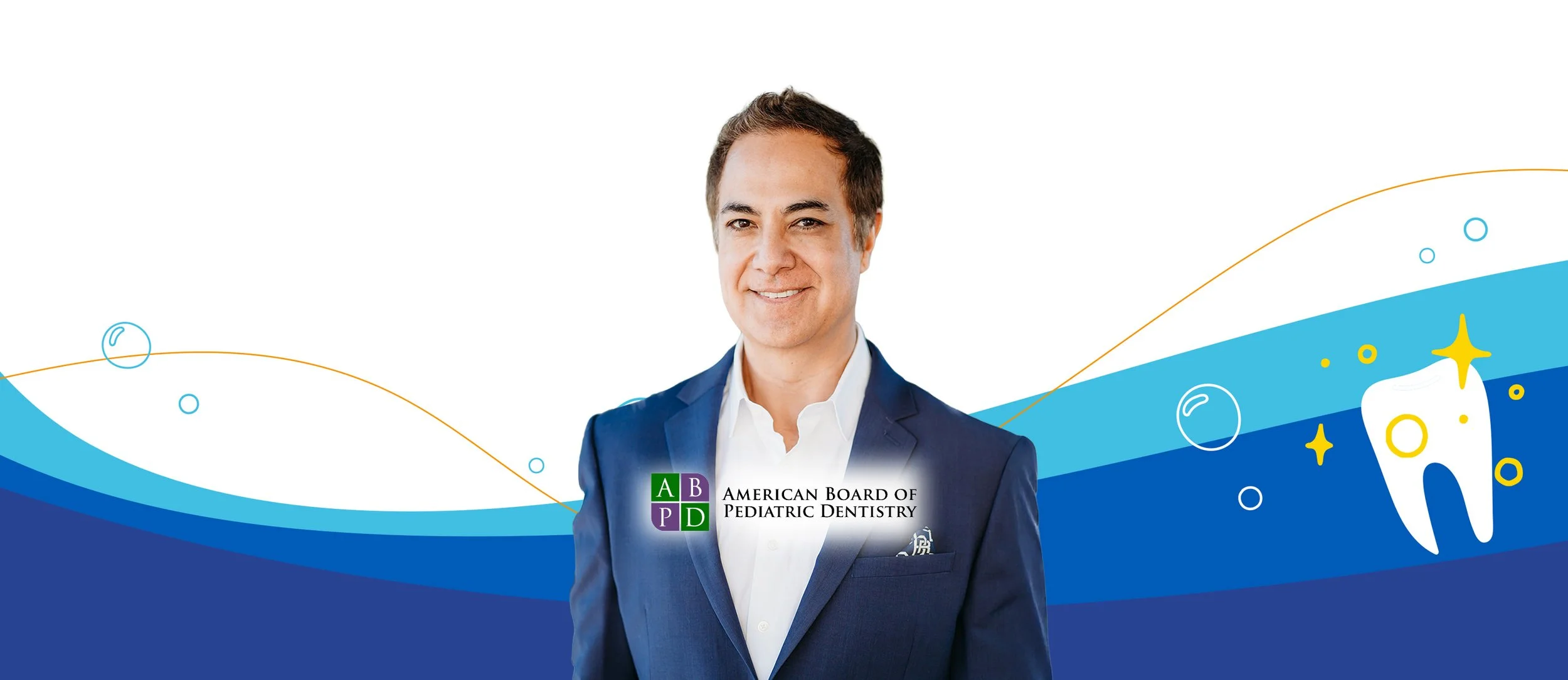 Dr. Ray wearing a suit and posing in front of a graphical sea background with the "American Board of Pediatric Dentistry" displayed over his chest area