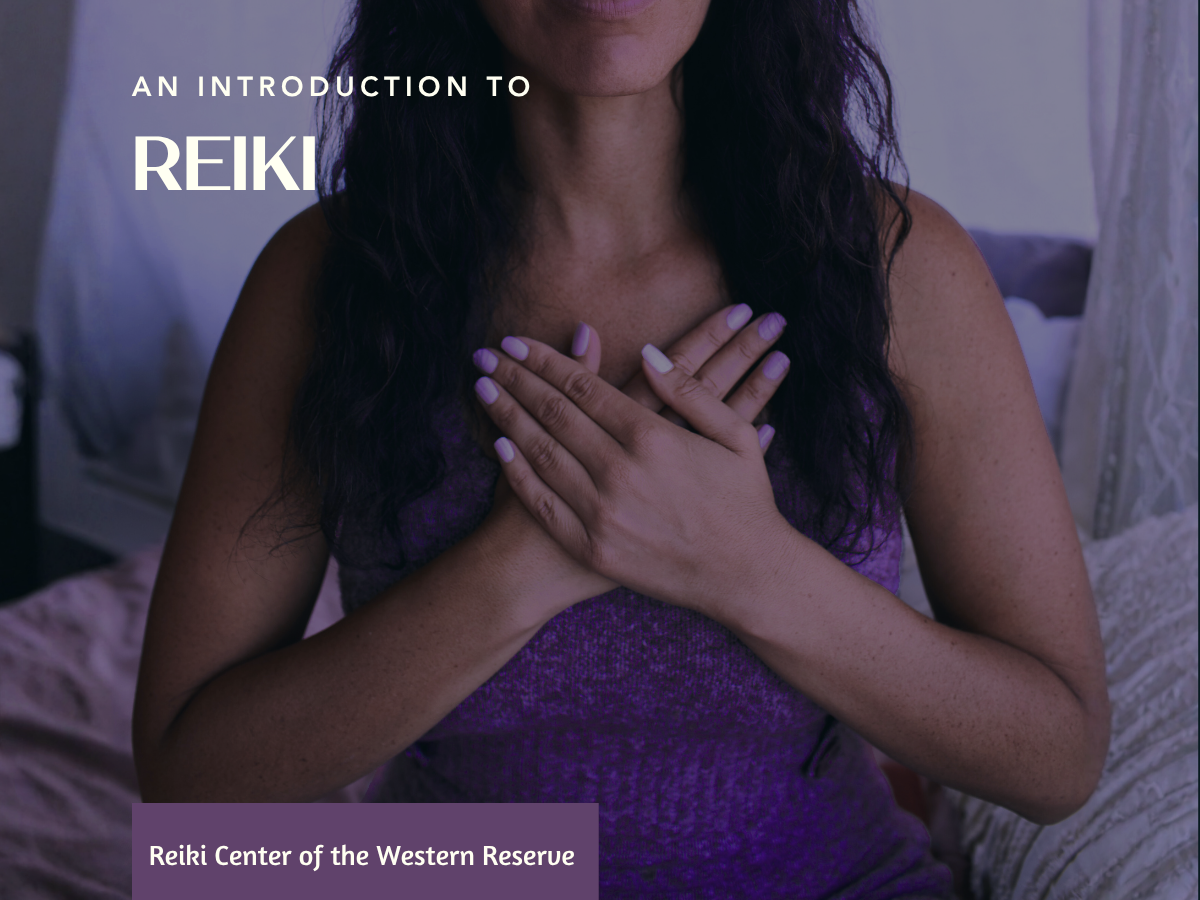 A woman places both hands on her heart, practicing self-Reiki.  Text overlay reads 'An Introduction to Reiki.  Reiki Center of the Western Reserve."