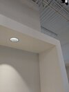 Nook, or overhang in front of a co-working space, with can light