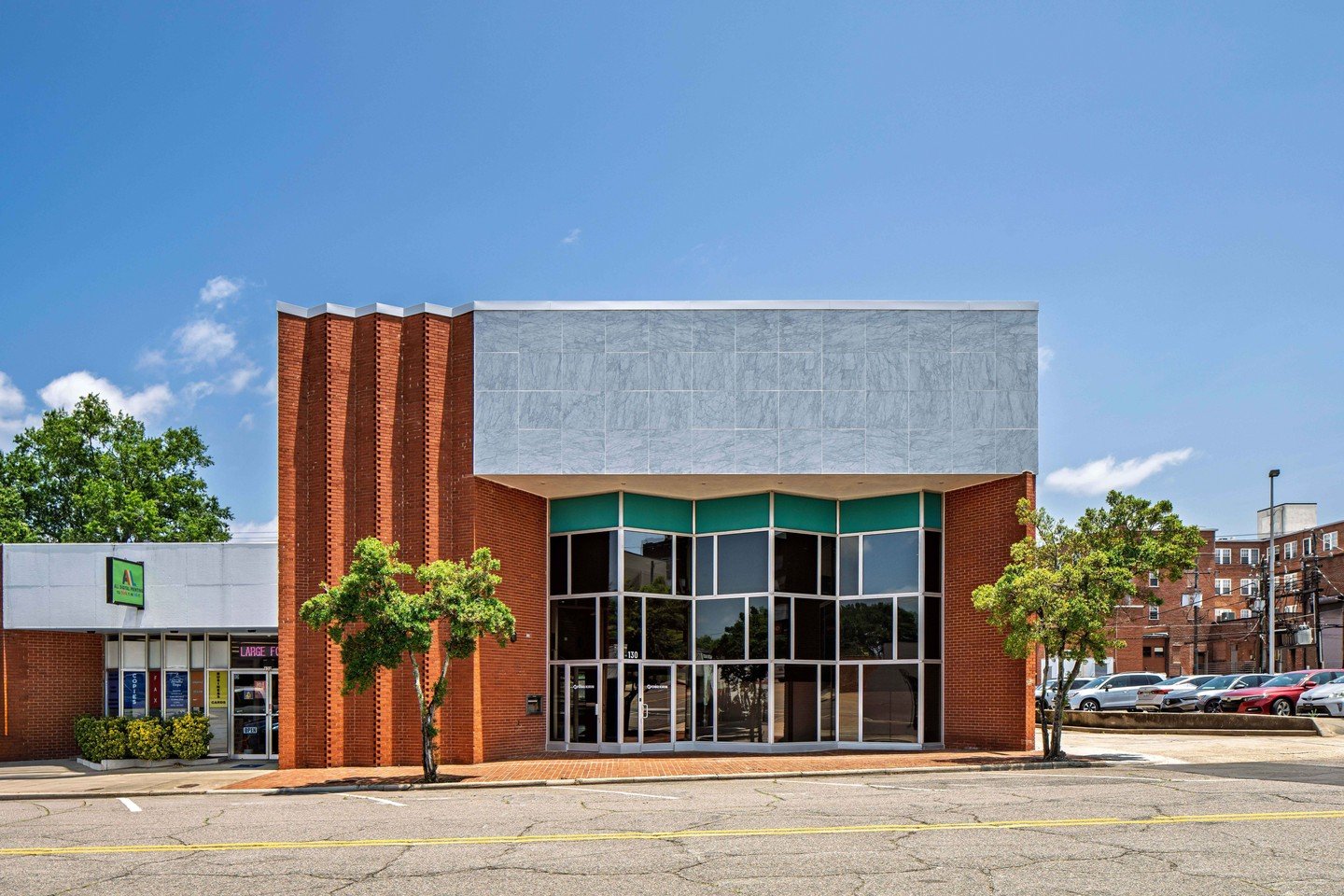 Designed in the early 1960s by Greensboro architect J. Hyatt Hammond, the Sanford Savings &amp; Loan Building is a mid-century standout in downtown Sanford and a contributing structure within the National Register Historic District.

Key architectura