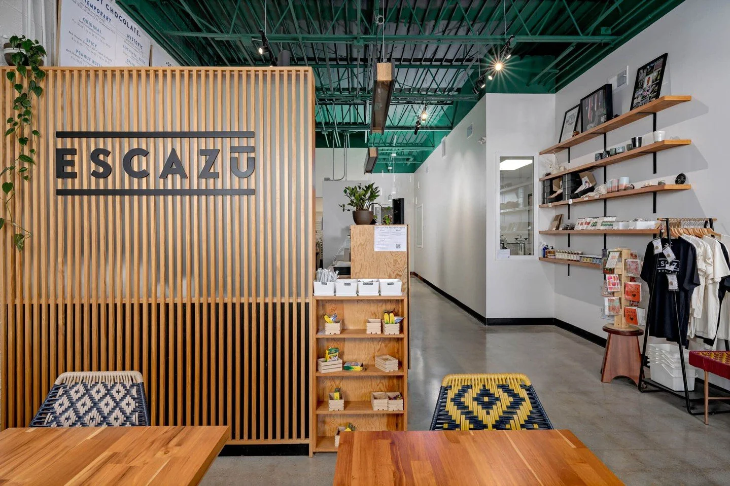 Escaz&uacute; is a well-loved, local chocolate maker rooted in craft and community. For their new space, we designed around millwork that was 
brought over from their former location, and expanded what mattered most: a larger, more efficient chocolat