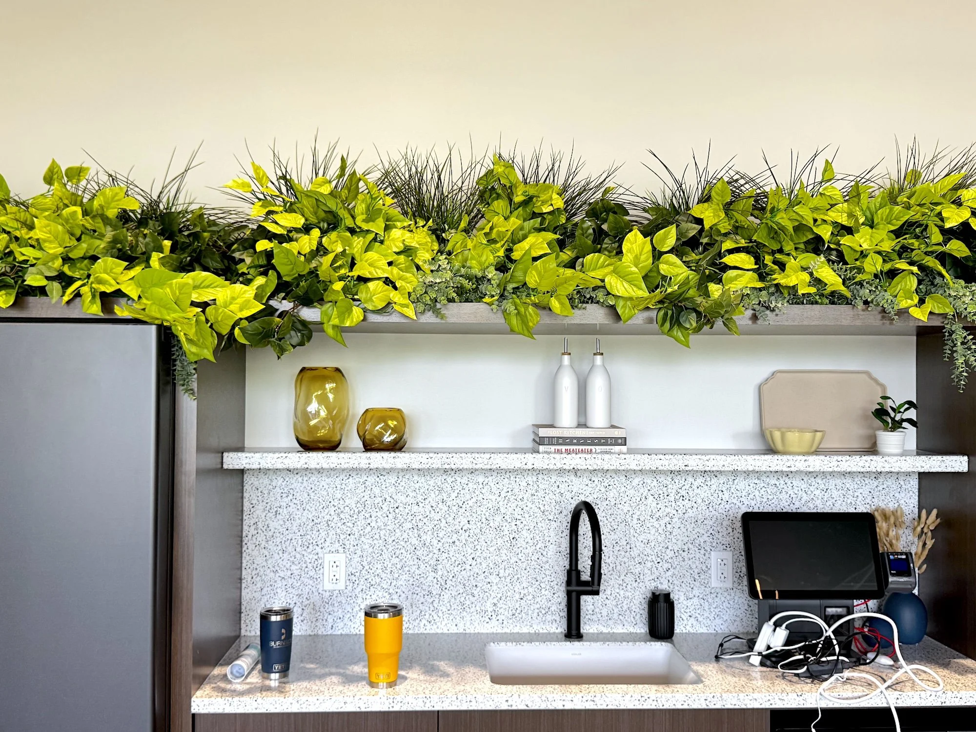 Faux Plants on shelf at Keystone at the Crossing office building in Indianapolis, IN.