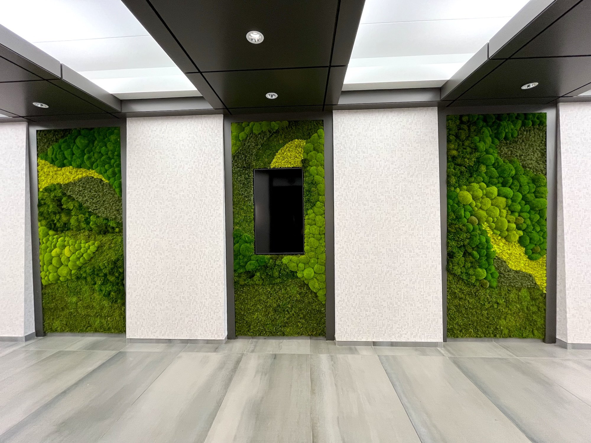 Three moss walls located in office building. 900 Carmel Gateway in Carmel, IN. 