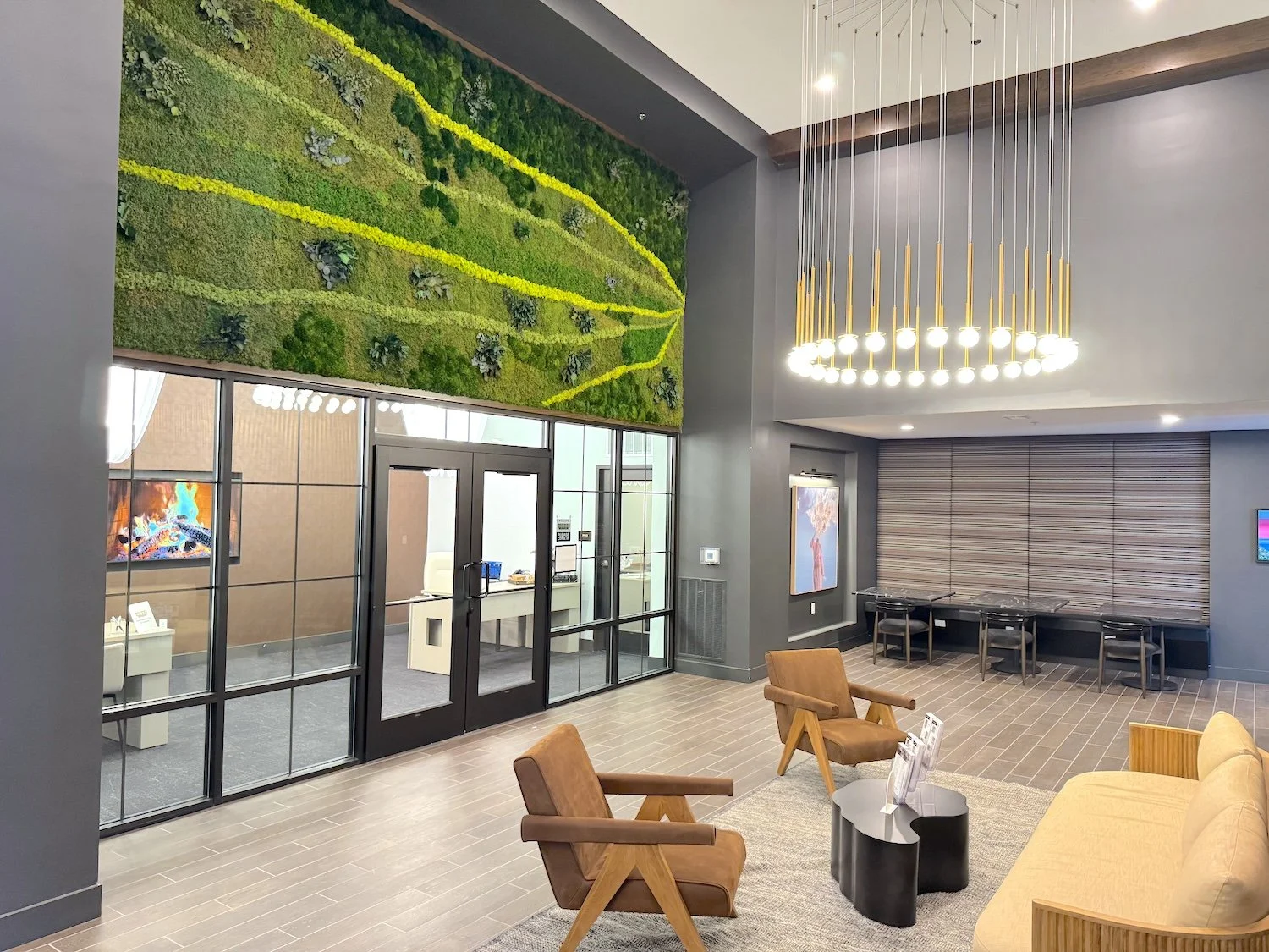 30 ft L x 10 ft H Moss Wall at Hobbs Station Luxury Apartments located in Plainfield, IN.