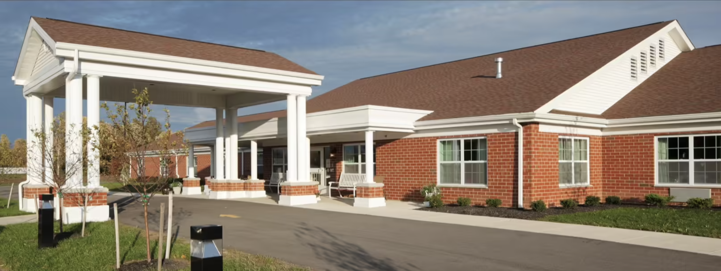 An exterior image of the main entrance at Crestwood in Wheatfield, NY.