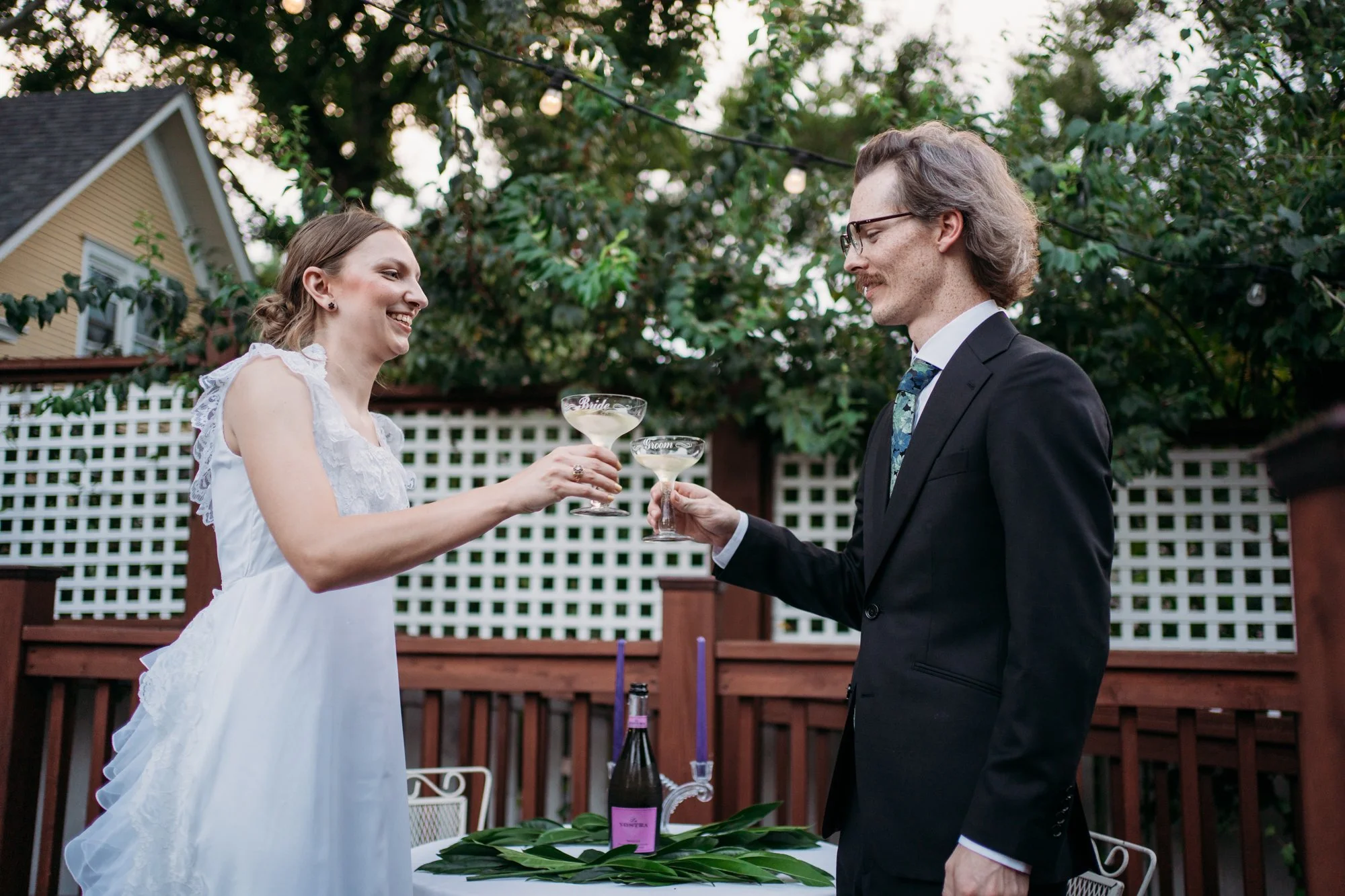 Zoe and Hunter make a toast at their reception.