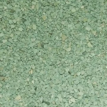 close-up of scattered green granules of Zeolite, a highly porous rock that removes zinc, copper, lead and other heavy metals from storm water.