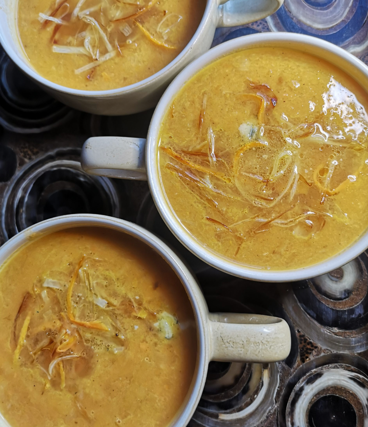 Sweet potato, leek and stilton soup in mugs