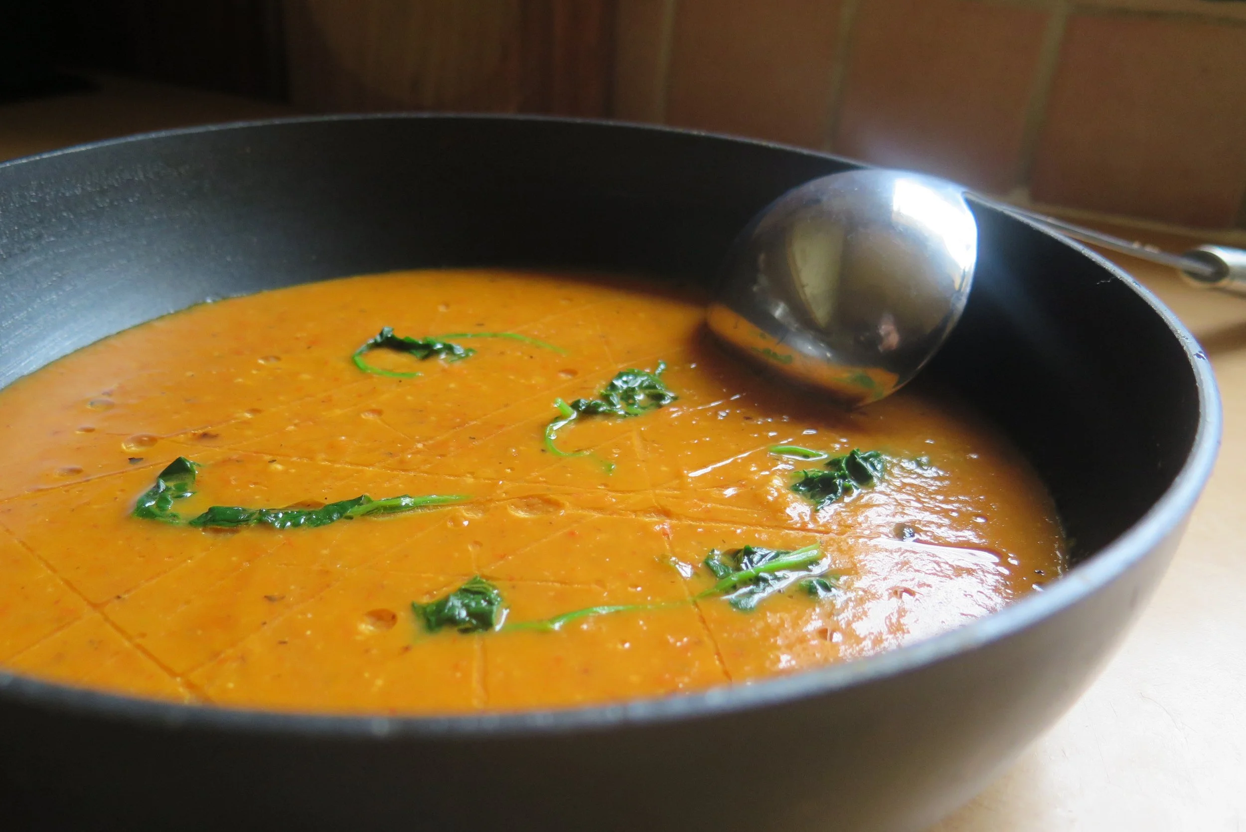 Chilli and cheese pumpkin soup in a bowl