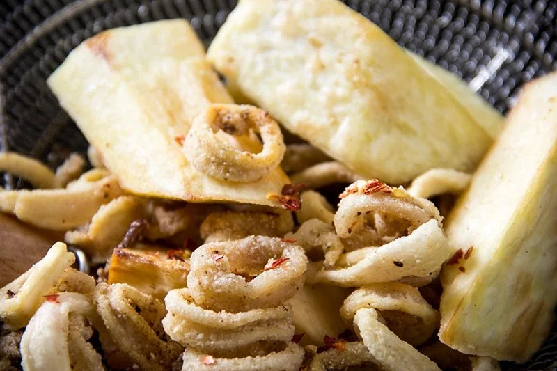 Crispy squid, seasoned with pepper and served with yam