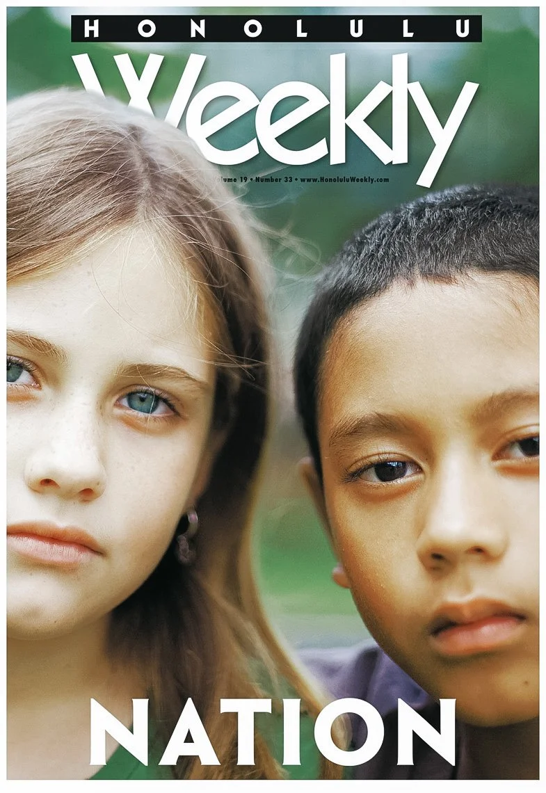 Cover of Honolulu Weekly with a close-up of a young boy and girl facing the camera, text "Nation" below.