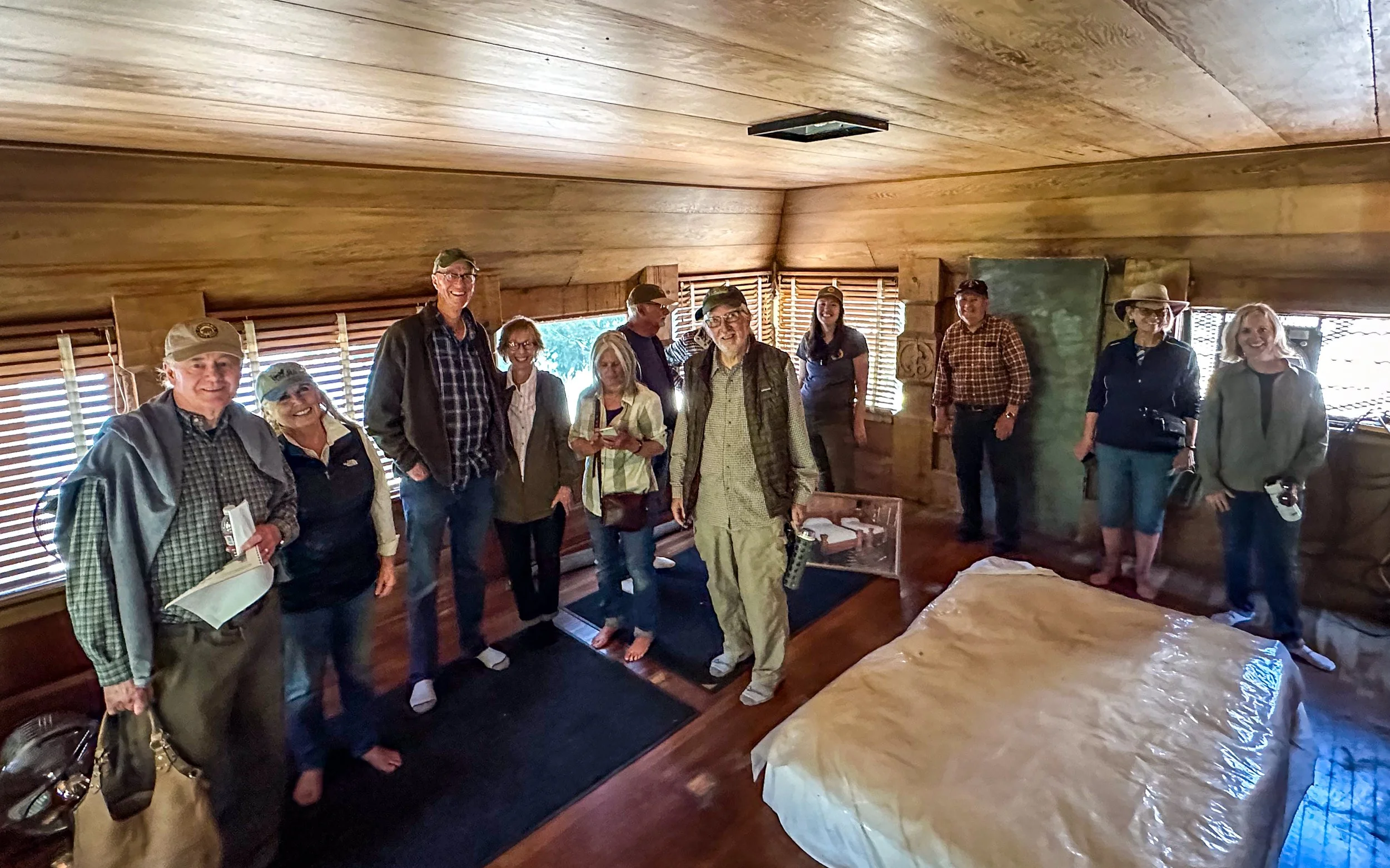 group of people in short ceiling room