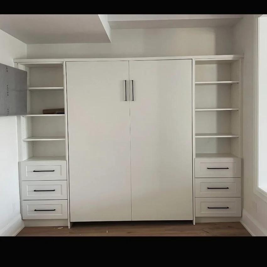Can you guess what I am? 

🚪....No
🗄️....No
🛏️....No 

I am actually all 3, a murphy bed with built in storage and cabinets! 

🛑Stop into our showroom located in Vaughan, Hwy 7 &amp; Jane St.

📲Reach out to us now for your complimentary in-home 