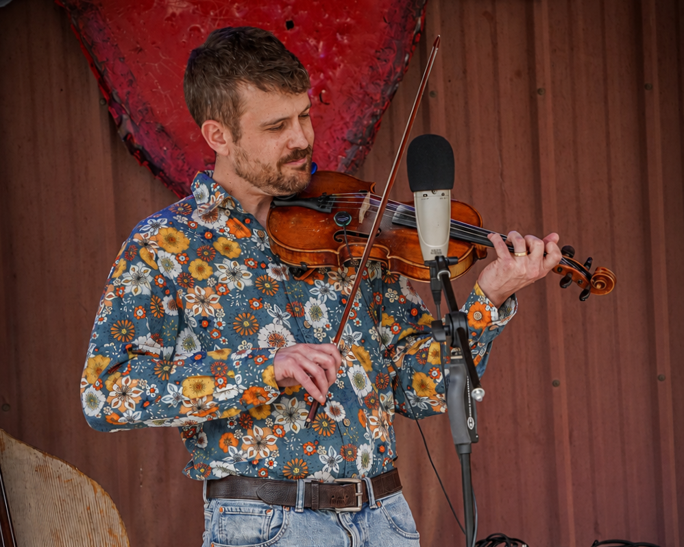 Jonah Chilton playing fiddle.