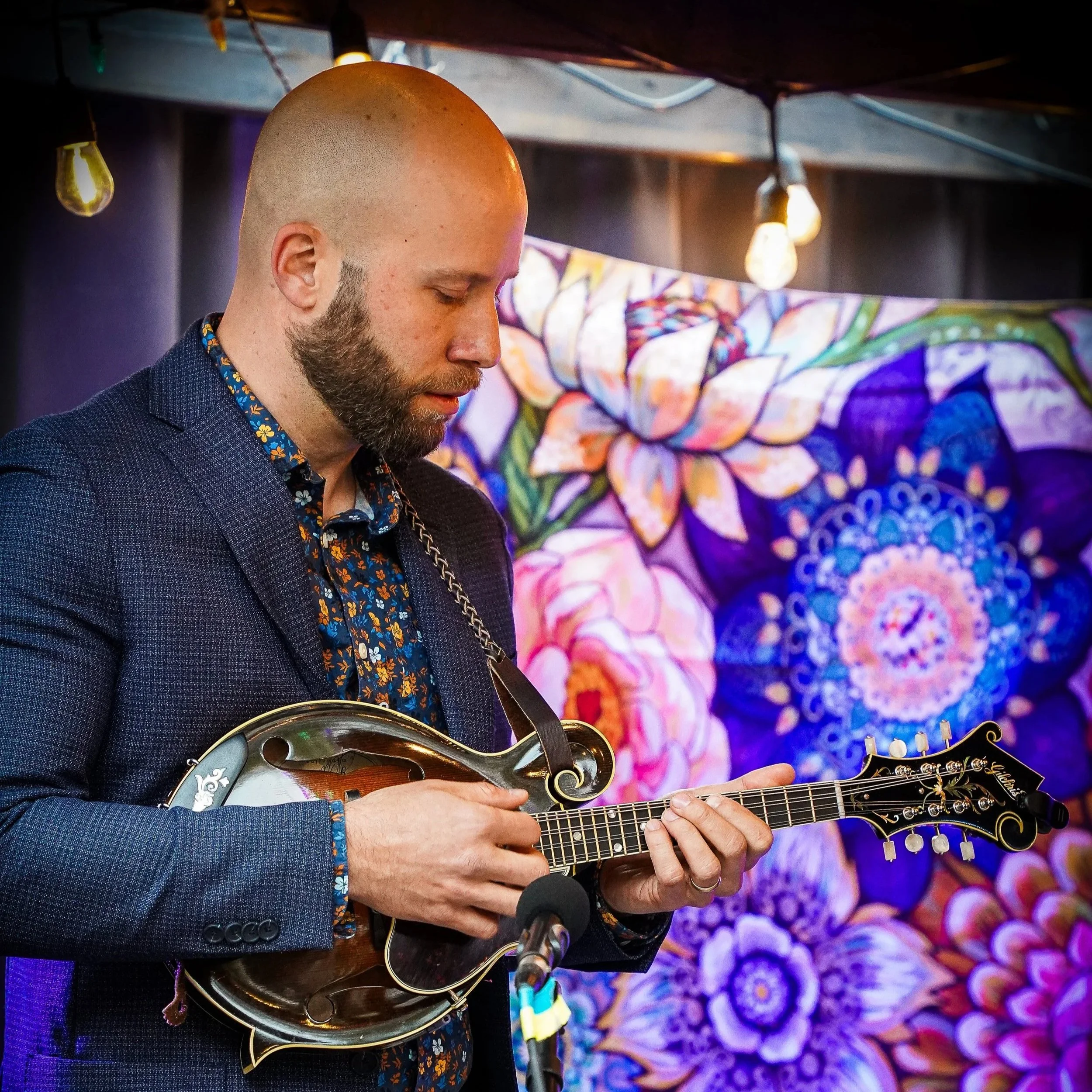 Dave Pailet playing mandolin.