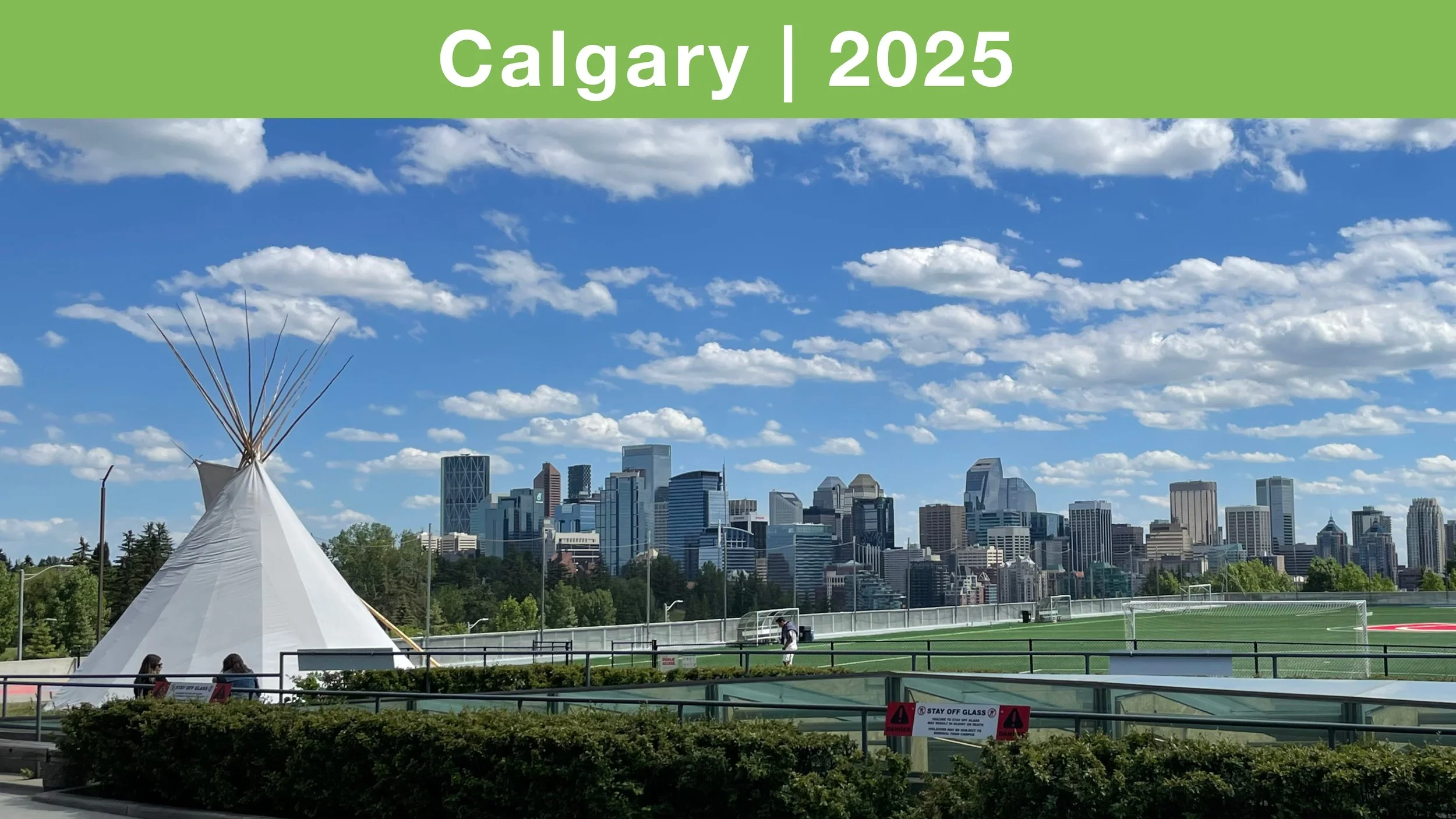 Calgary skyline with large tipi in foreground 2025
