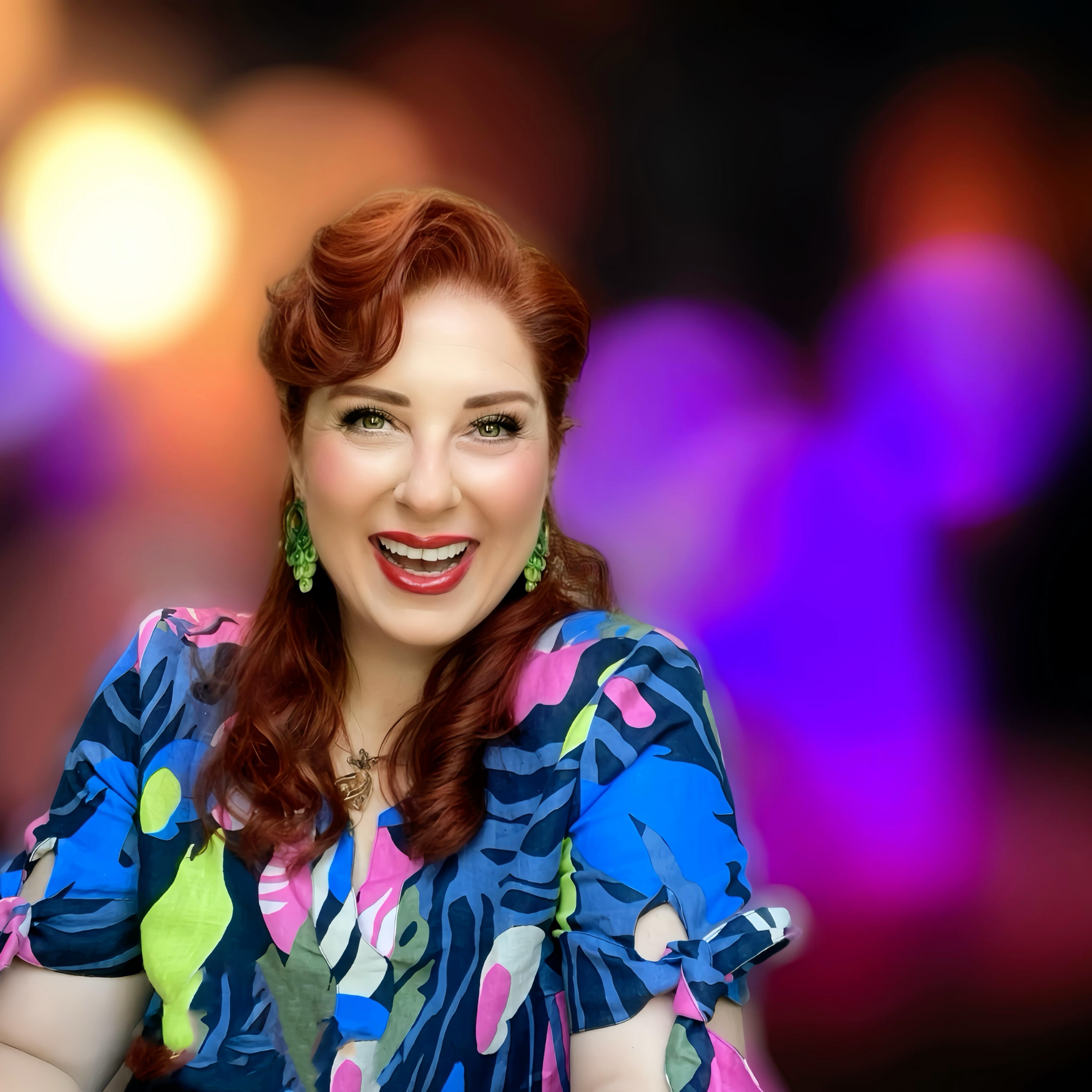 Demet Tuncer smiling, portrait for media and press use.