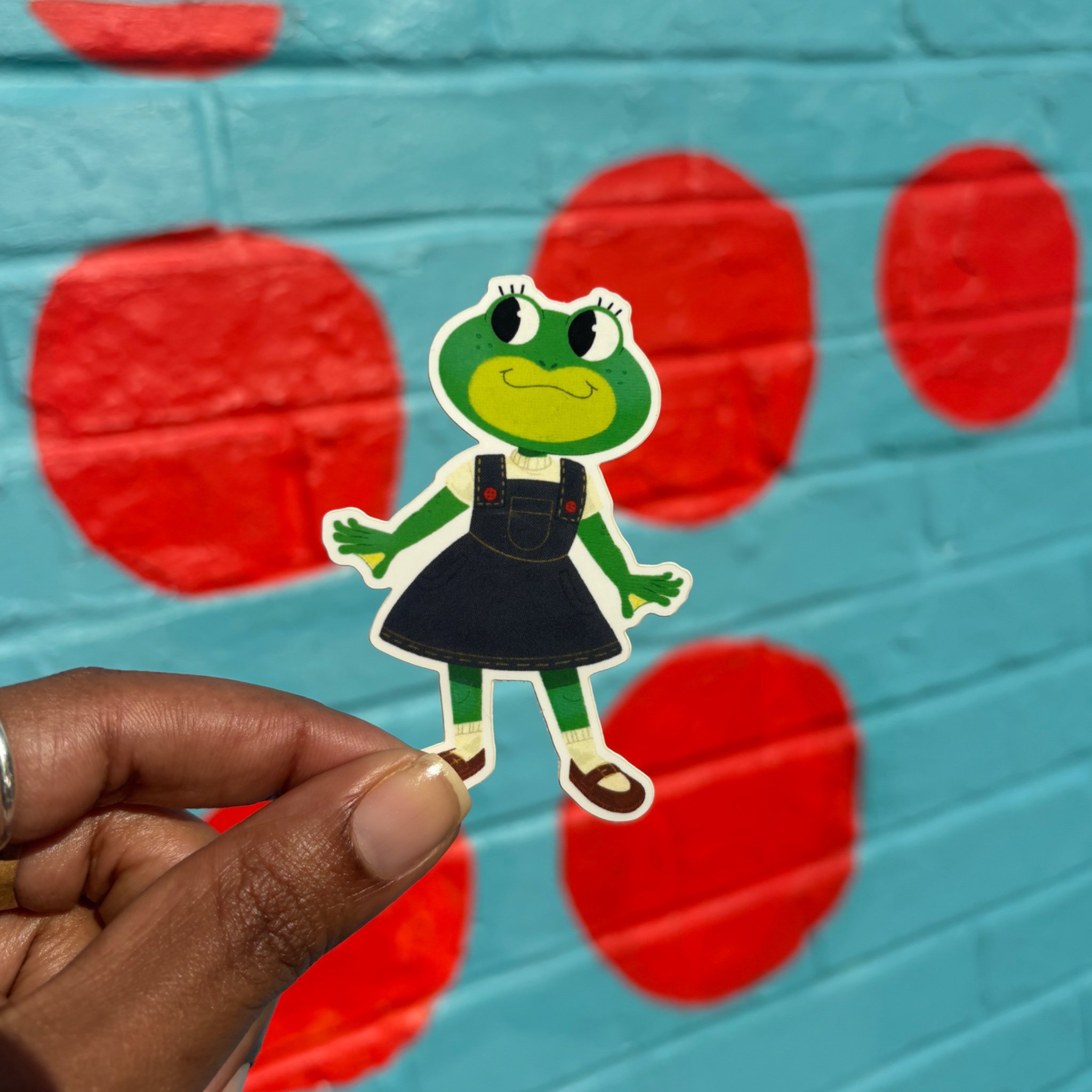 Illustrated anthropomorphic frog girl sticker by DeAndra Hodge