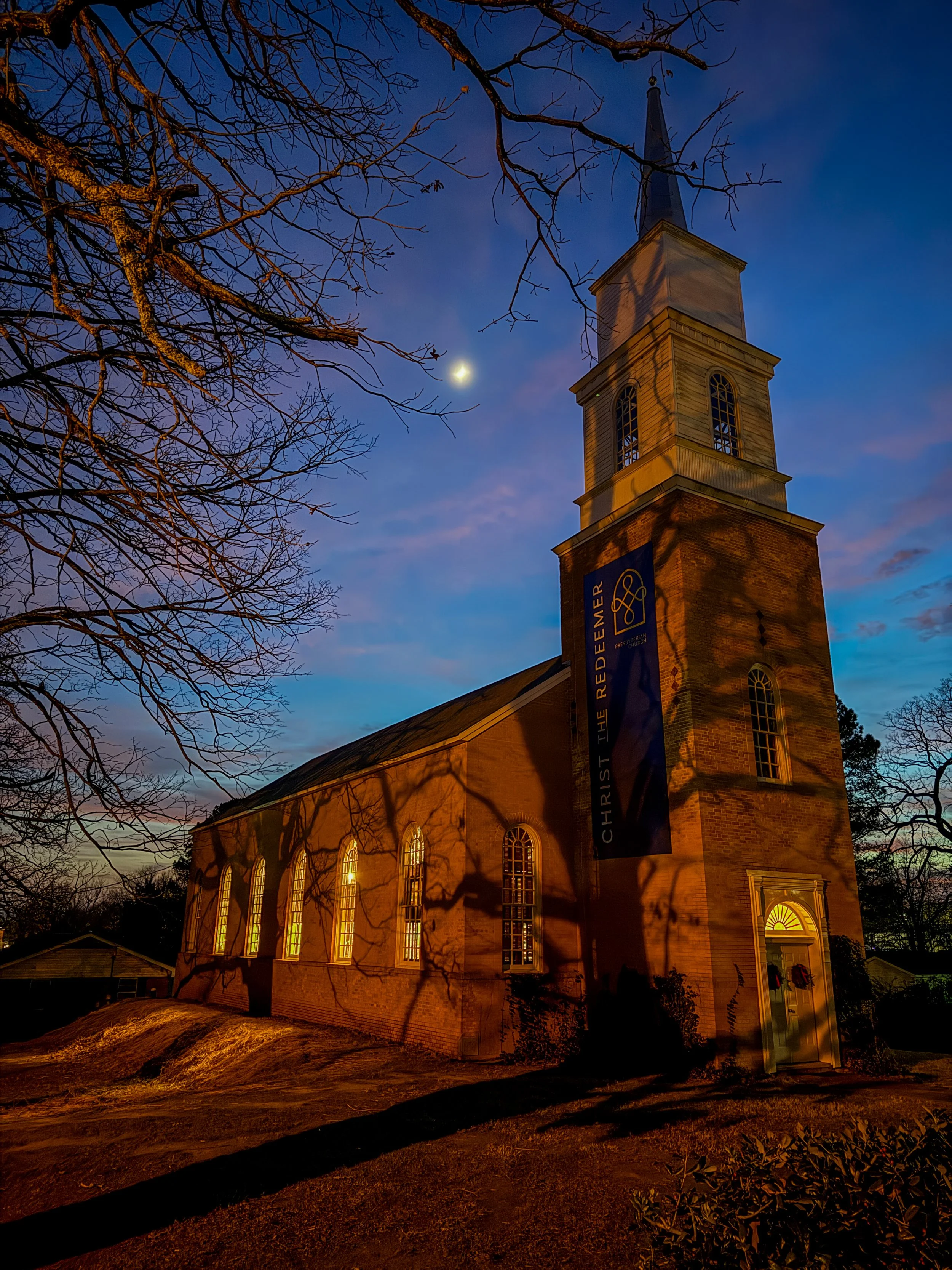 exterior shot of the church building during dusk