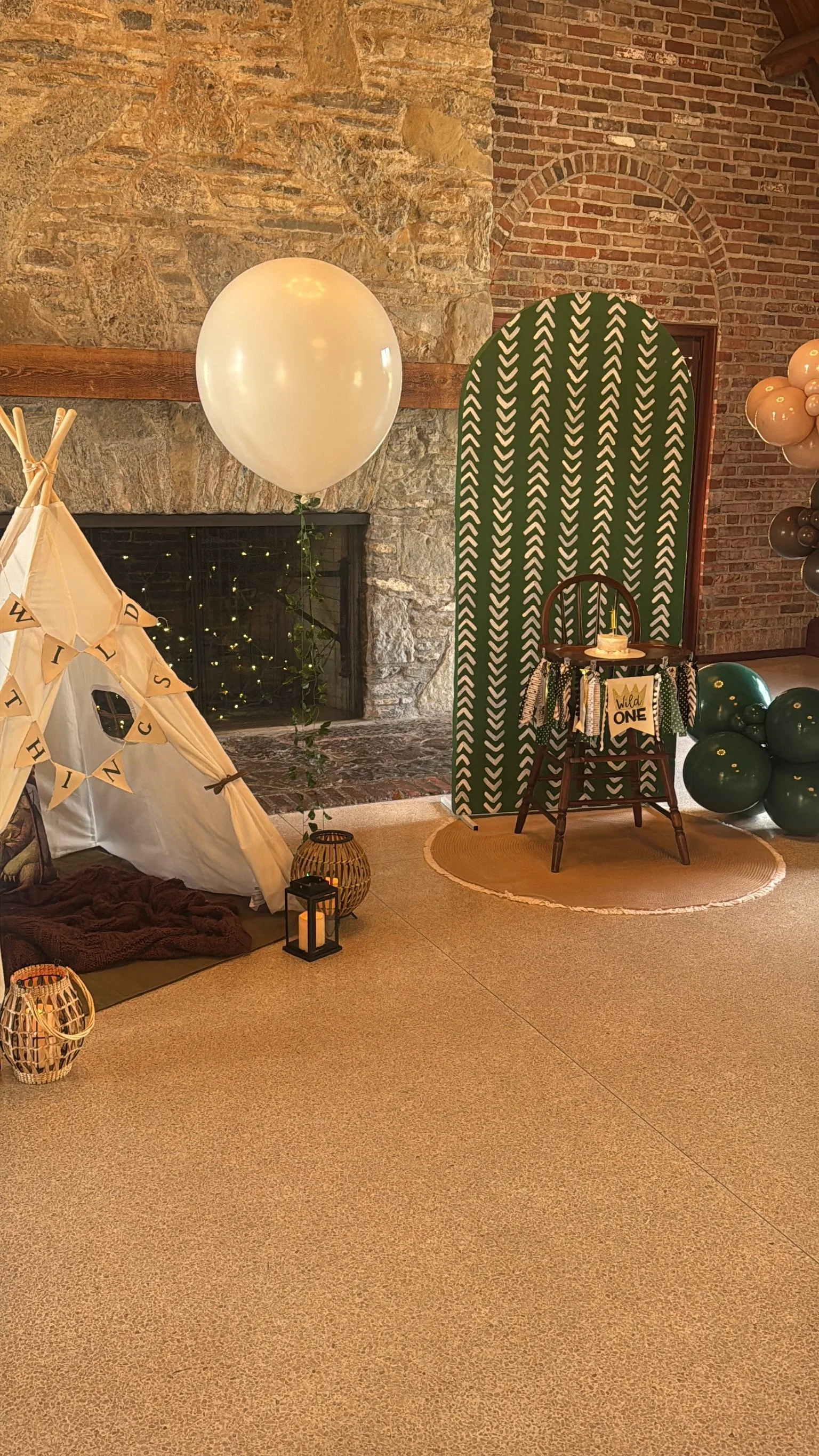 foam backdrop with teepee and helium balloon  for 1st birthday