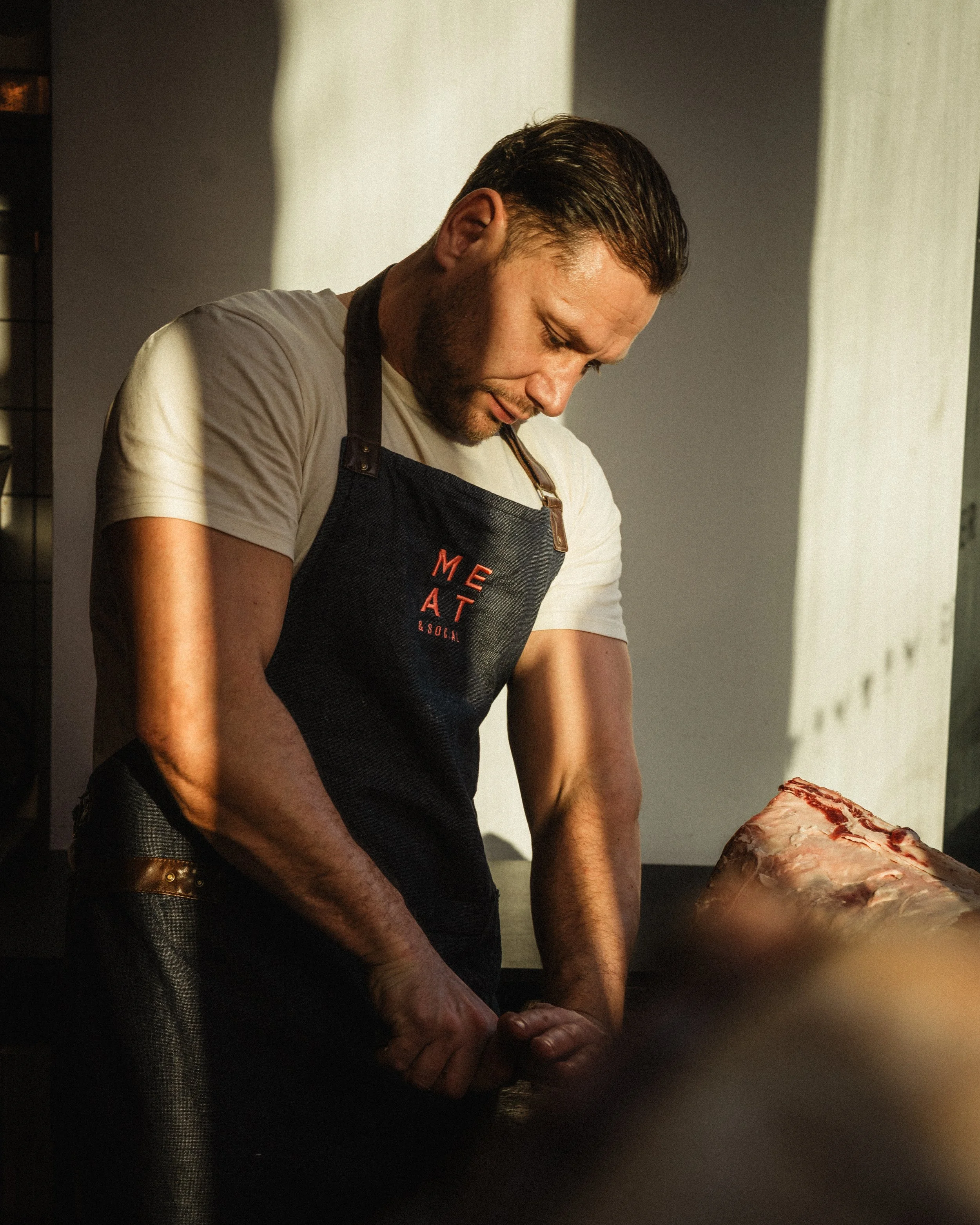 At the core of Meat & Social is Bartosz Frankowski, the Master Butcher whose passion and expertise shape everything the restaurant stands for. With decades of experience and a commitment to traditional butchery, Bartosz brings exceptional skill and i