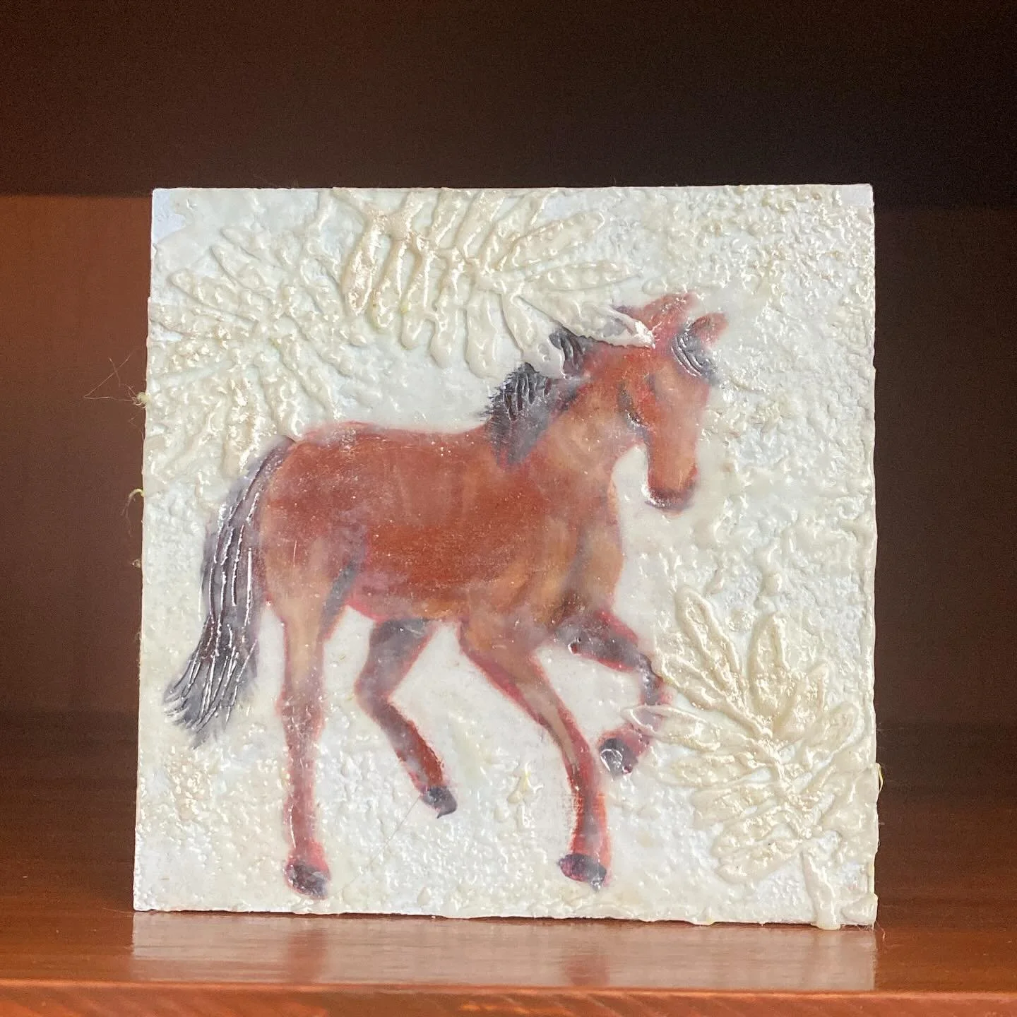 This dancing horse is one of my favorites. It can sit on a shelf or hang on the wall.