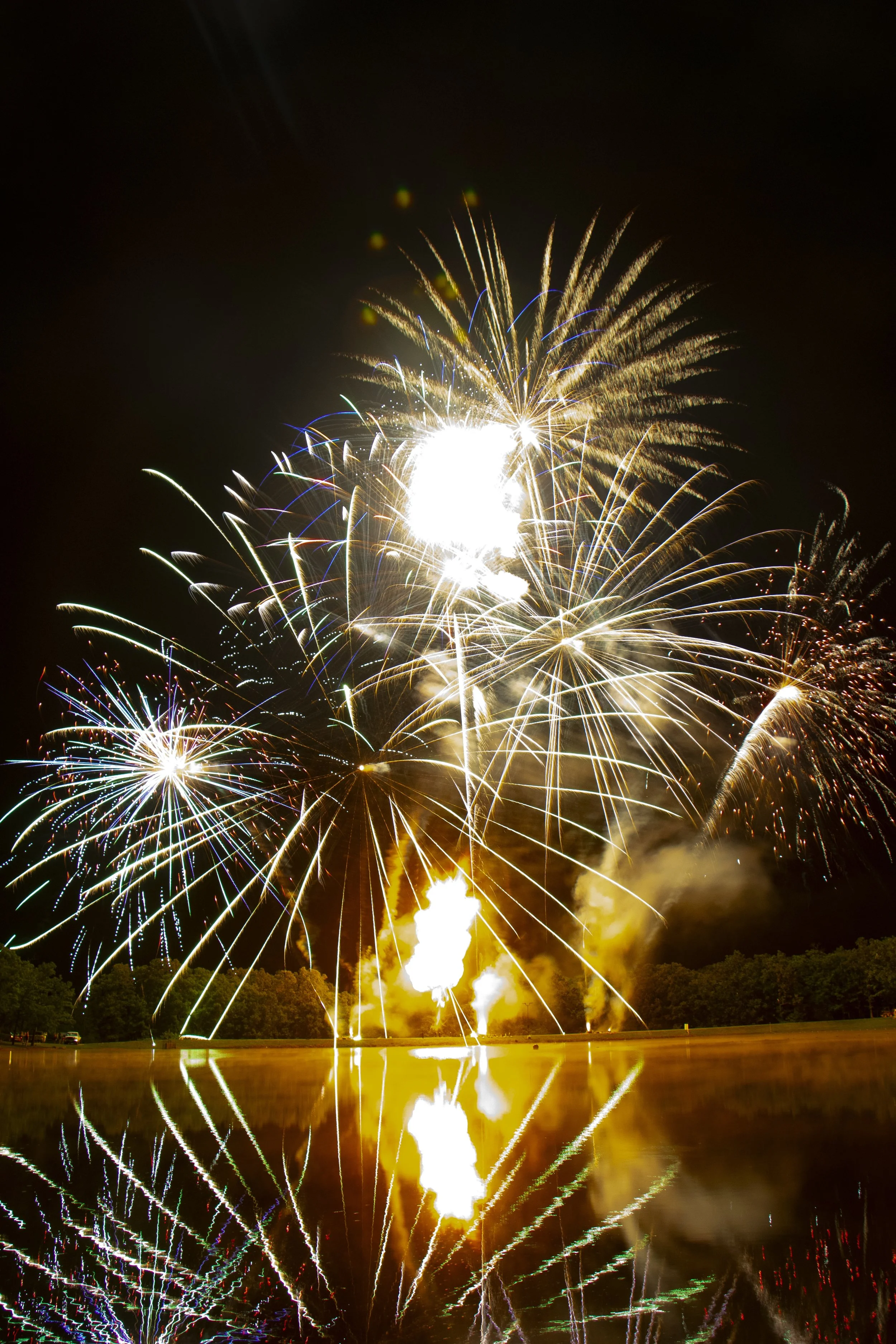 1.3, 1.4, and fireballs over lake, professional fireworks display