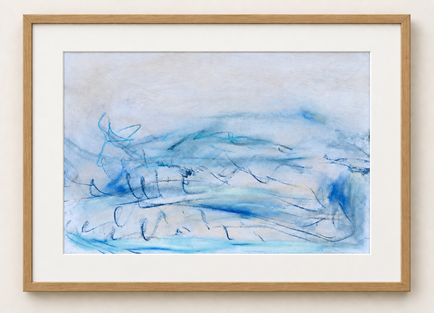 Light oak framed artwork on a white wall.png