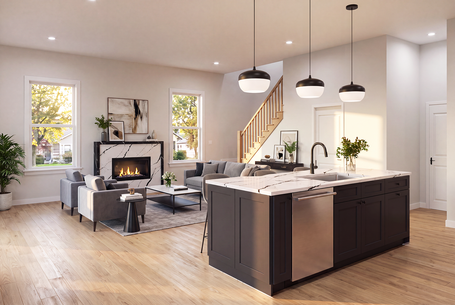 Open-plan living room and kitchen with modern decor, a fireplace, gray sofa and chairs, black and white marble fireplace, and pendant lights over kitchen island