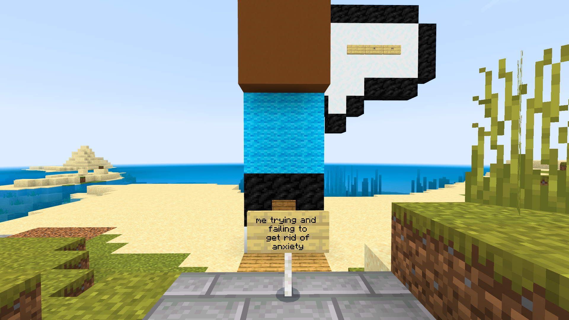 James’ representation of anxiety from another angle, showing the sign he placed stating ‘Me trying and failing to get rid of anxiety’.