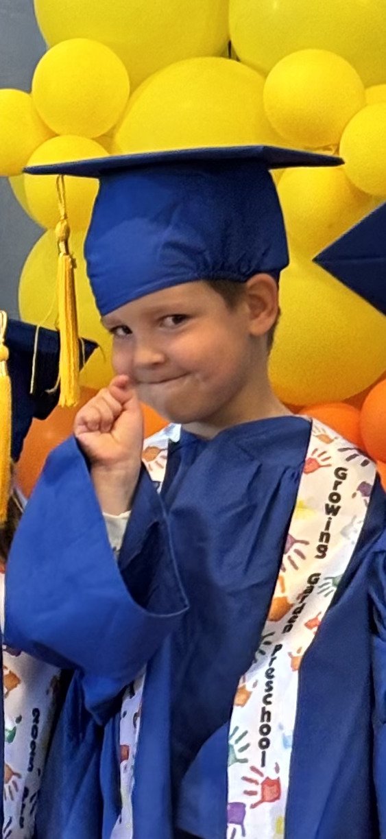 My boy graduating preschool