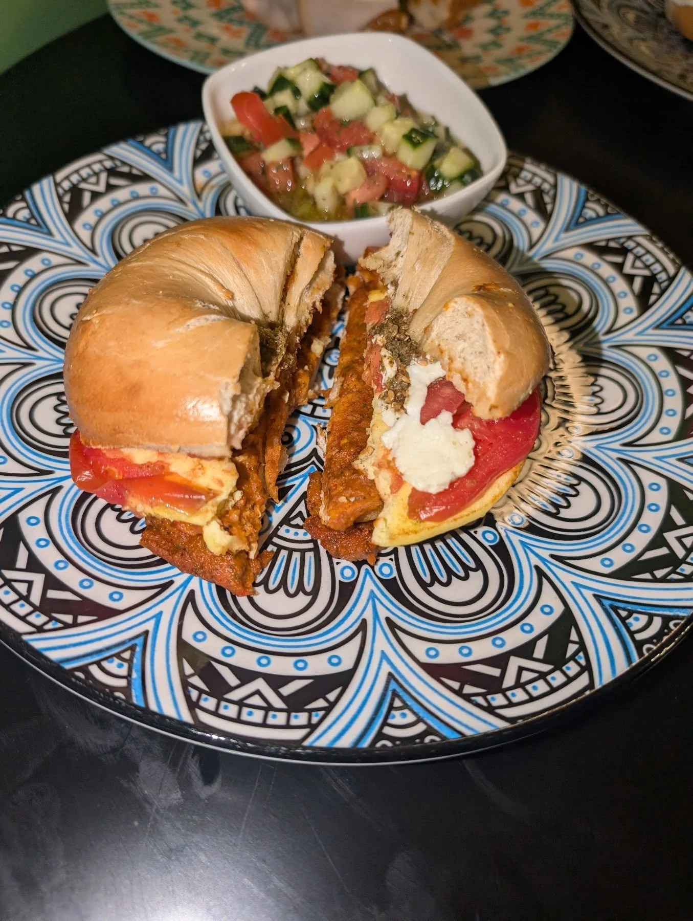 Our shakshouka sandwich is a delicious unique creation, taking inspiration from the classic north African dish. We add muhammara, eggs, Nabulsi cheese, tomatoes, olive oil, and zaatar to a bagel. 

All toasted together it creates the perfect comforti