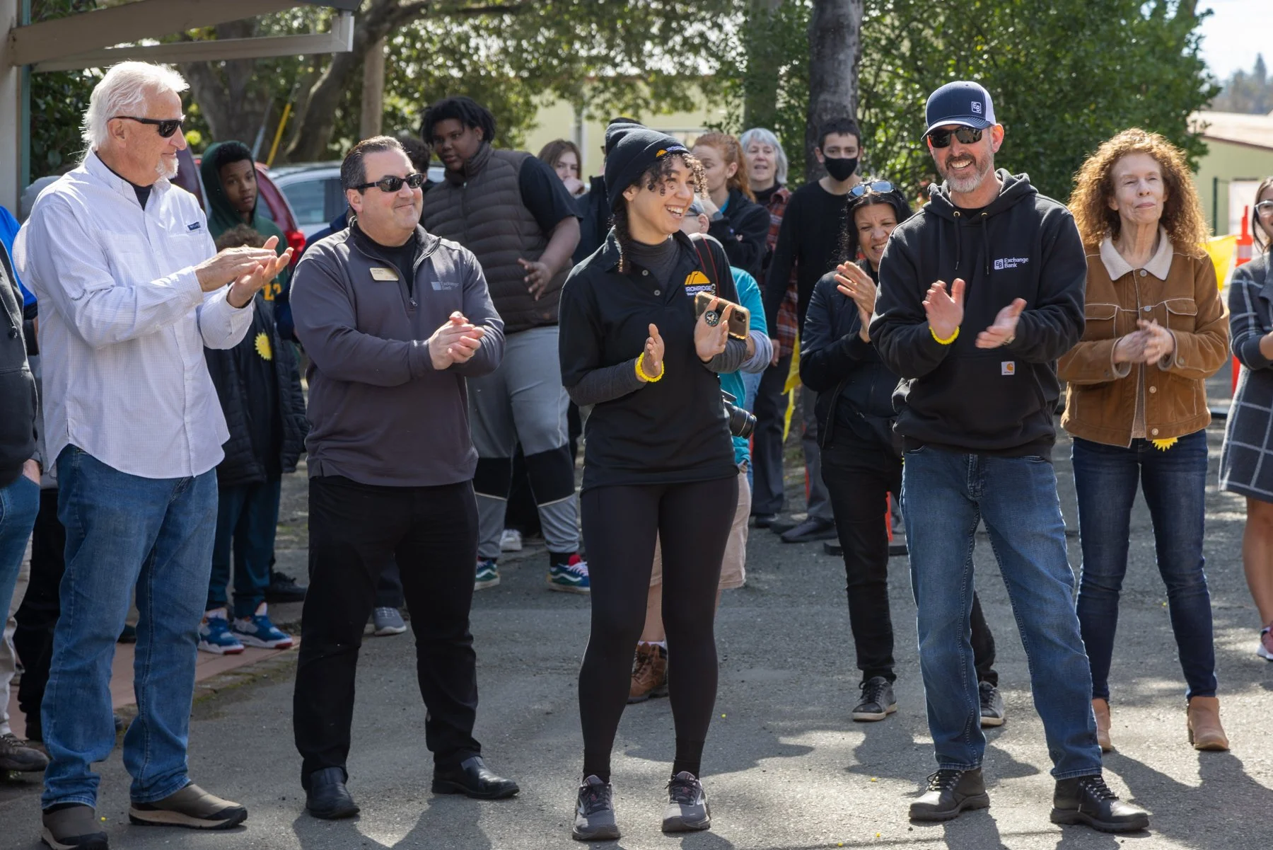group of people clapping